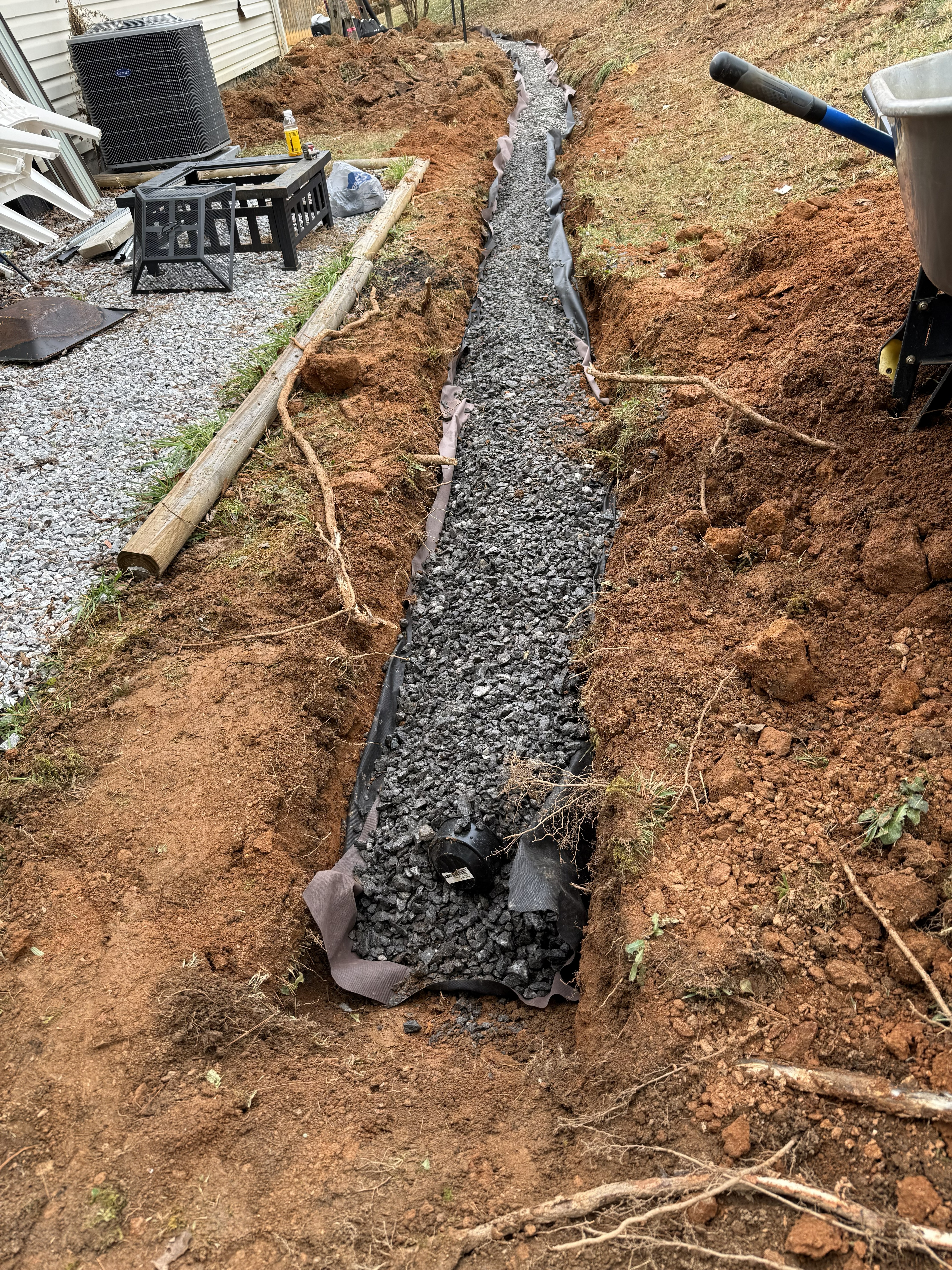 Timber retaining wall installed by AroLite Group in East TN