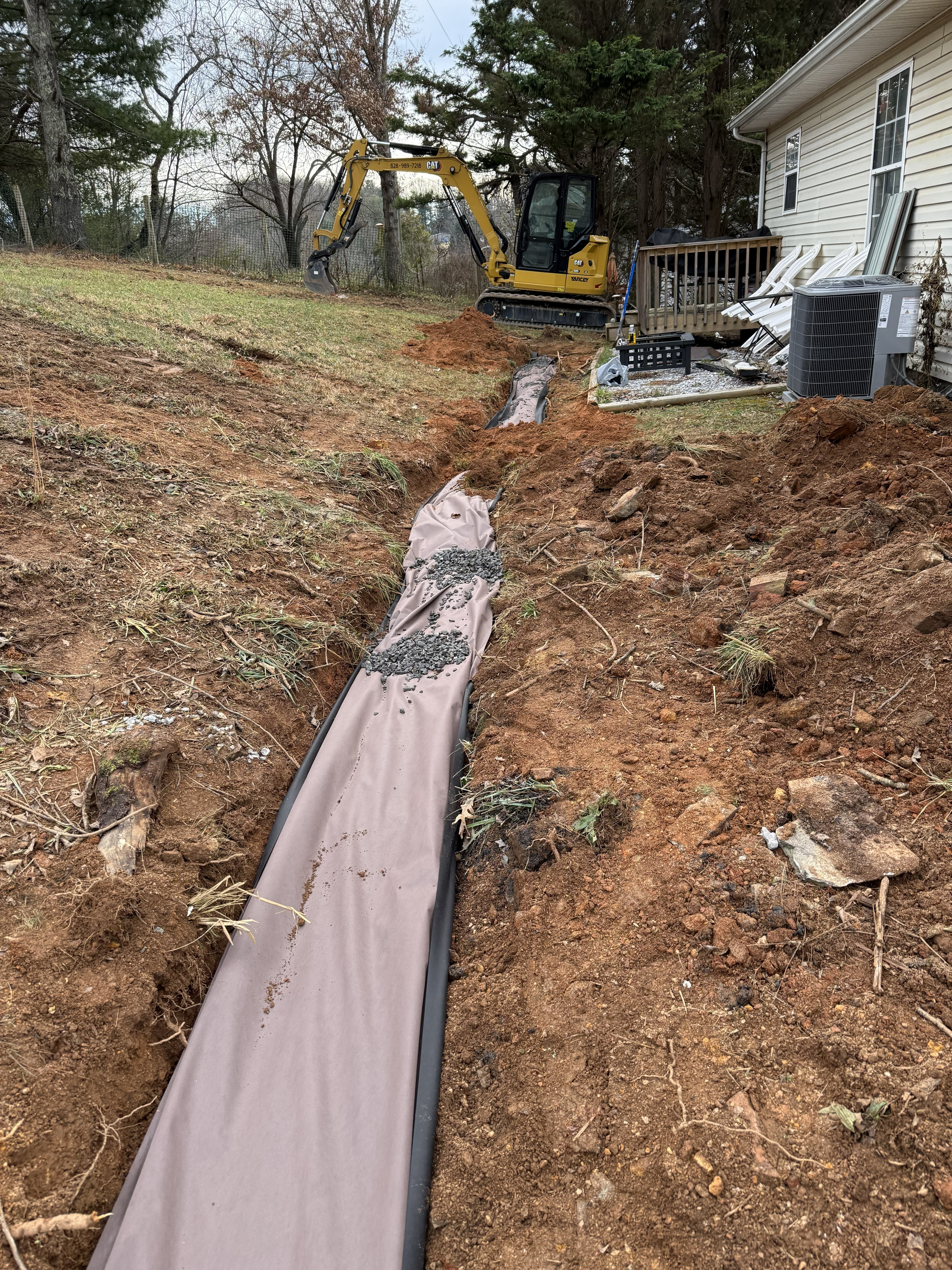 Retaining wall installation by AroLite Group