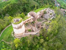 Blooms Rocks Ruins daytrips cluj napoca — Bologa Fortress ruins and sweeping Transylvanian valley panoramas