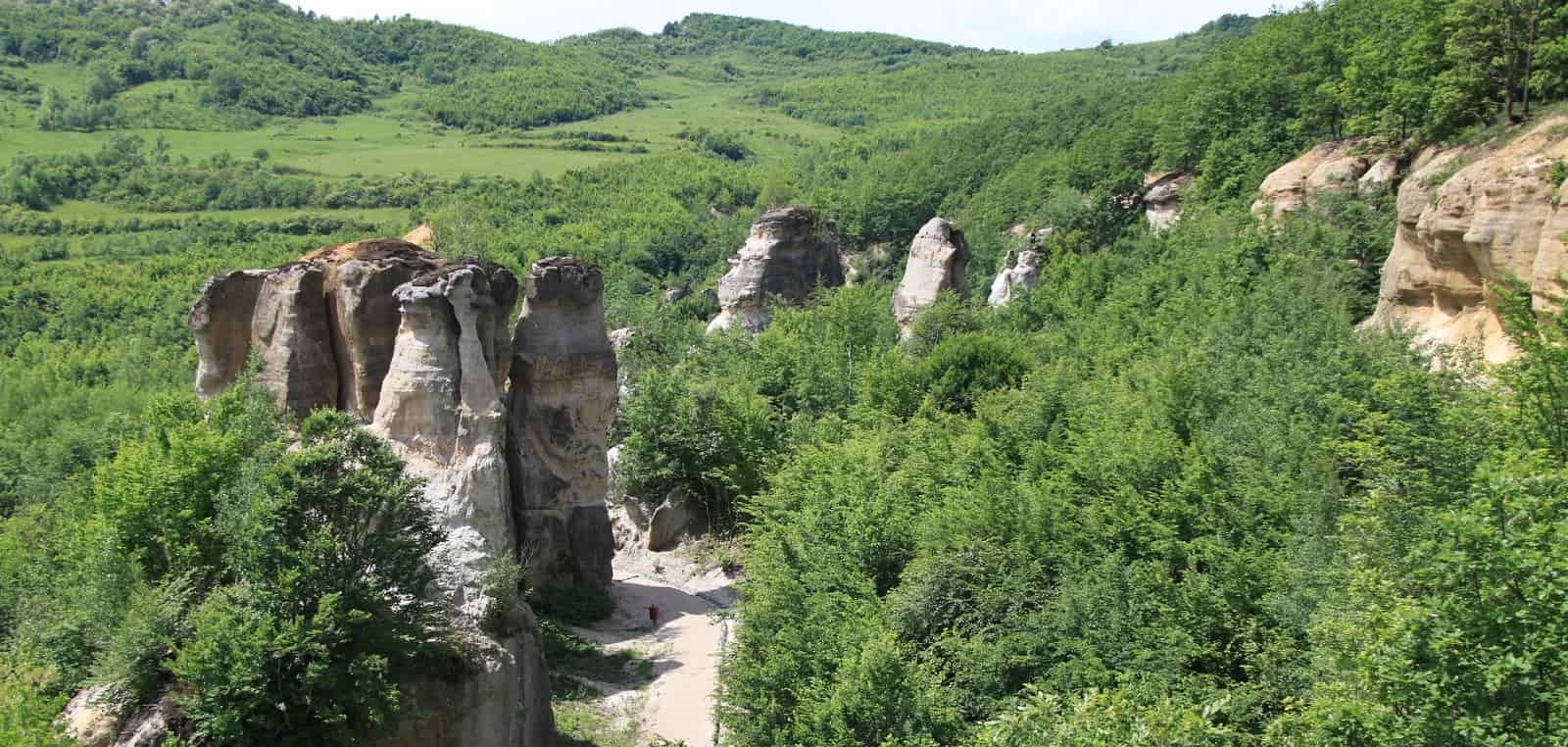 Blooms Rocks Ruins daytrips cluj napoca — Grădina Zmeilor, surreal sandstone dragon pillars of Romania