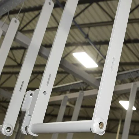 Powder coating detail work on precision parts