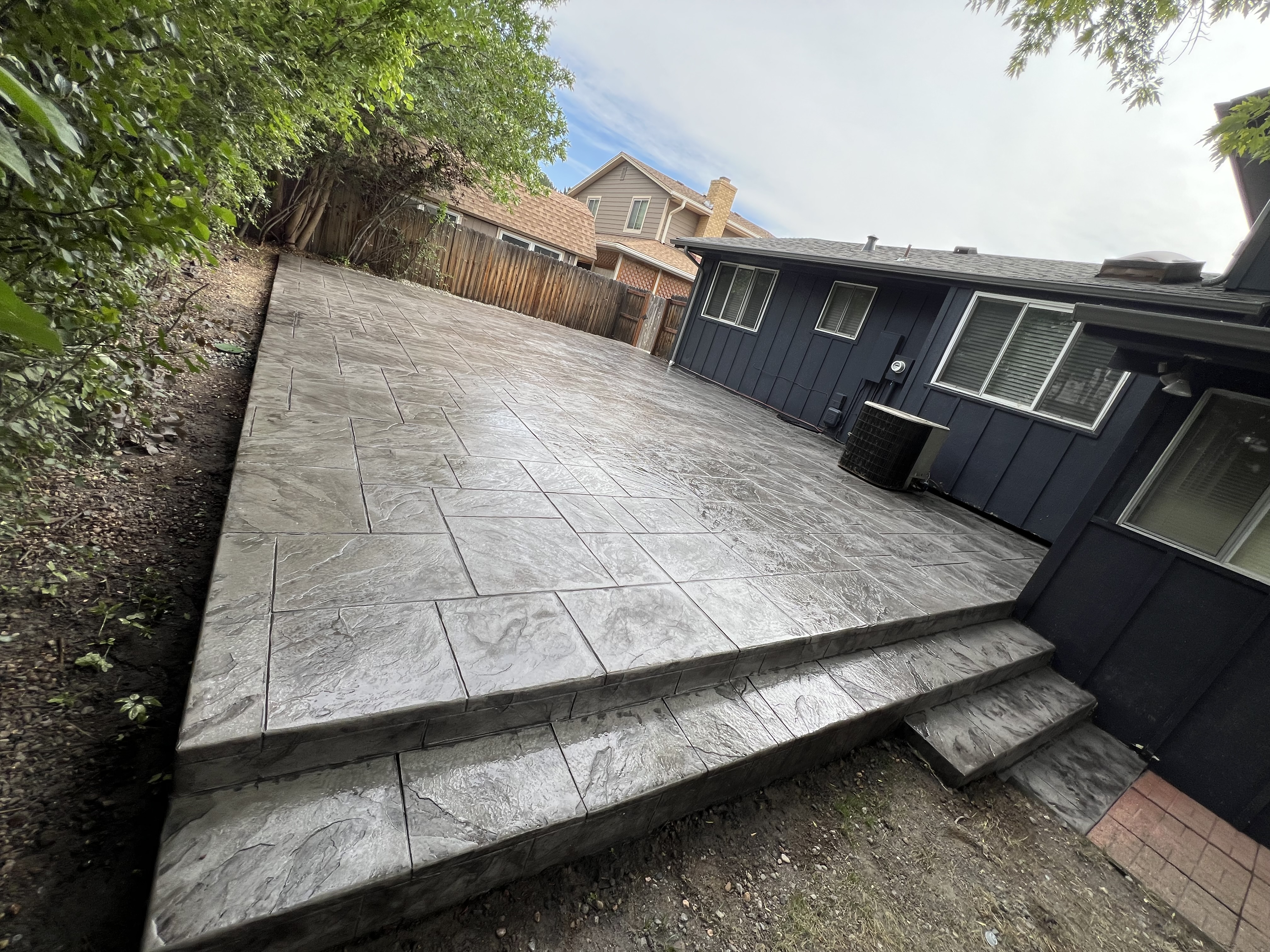 Stamped concrete patio installed in Arvada, CO by C&O Concrete