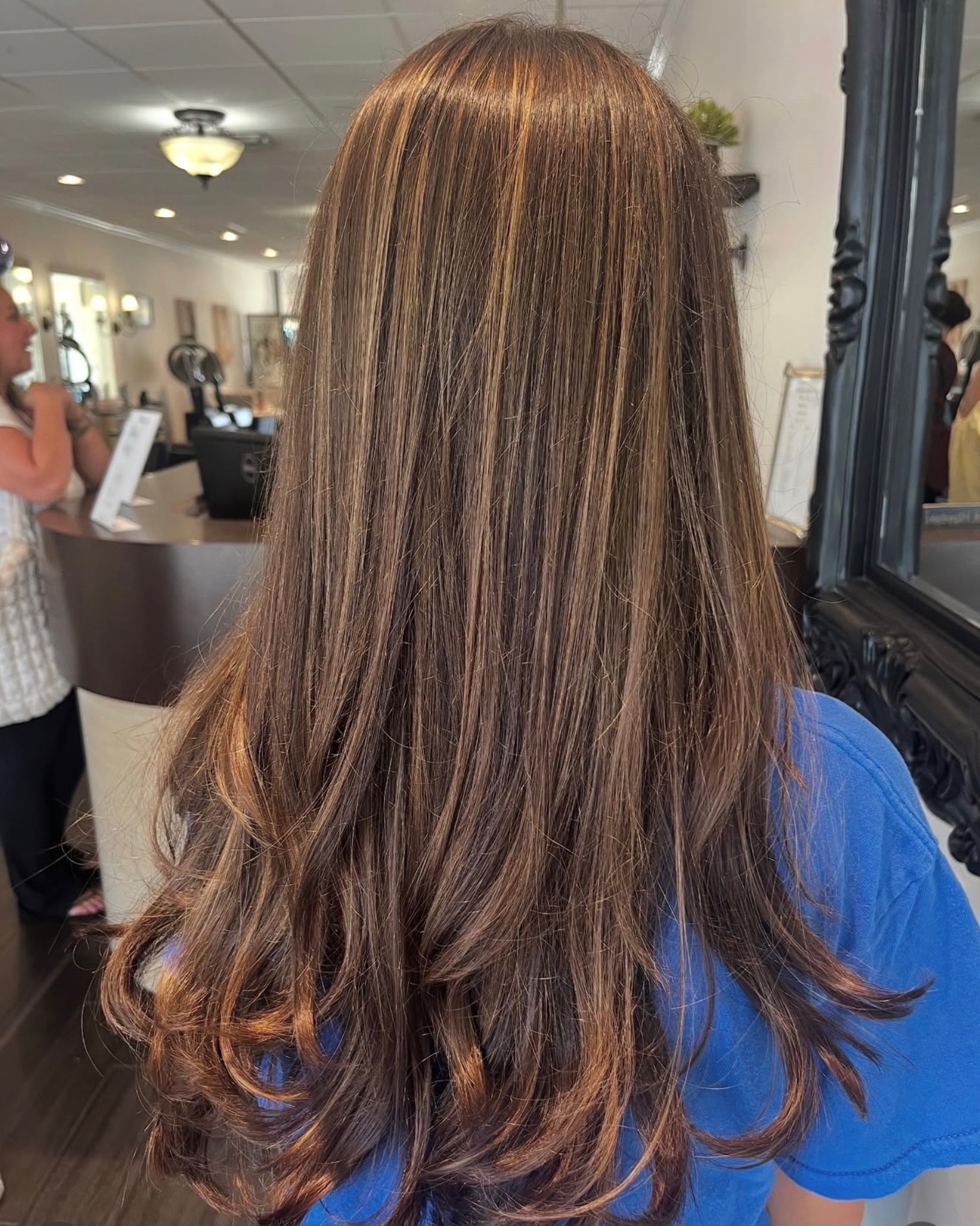 Professional blowout styling at Mirror Mirror Hair Boutique