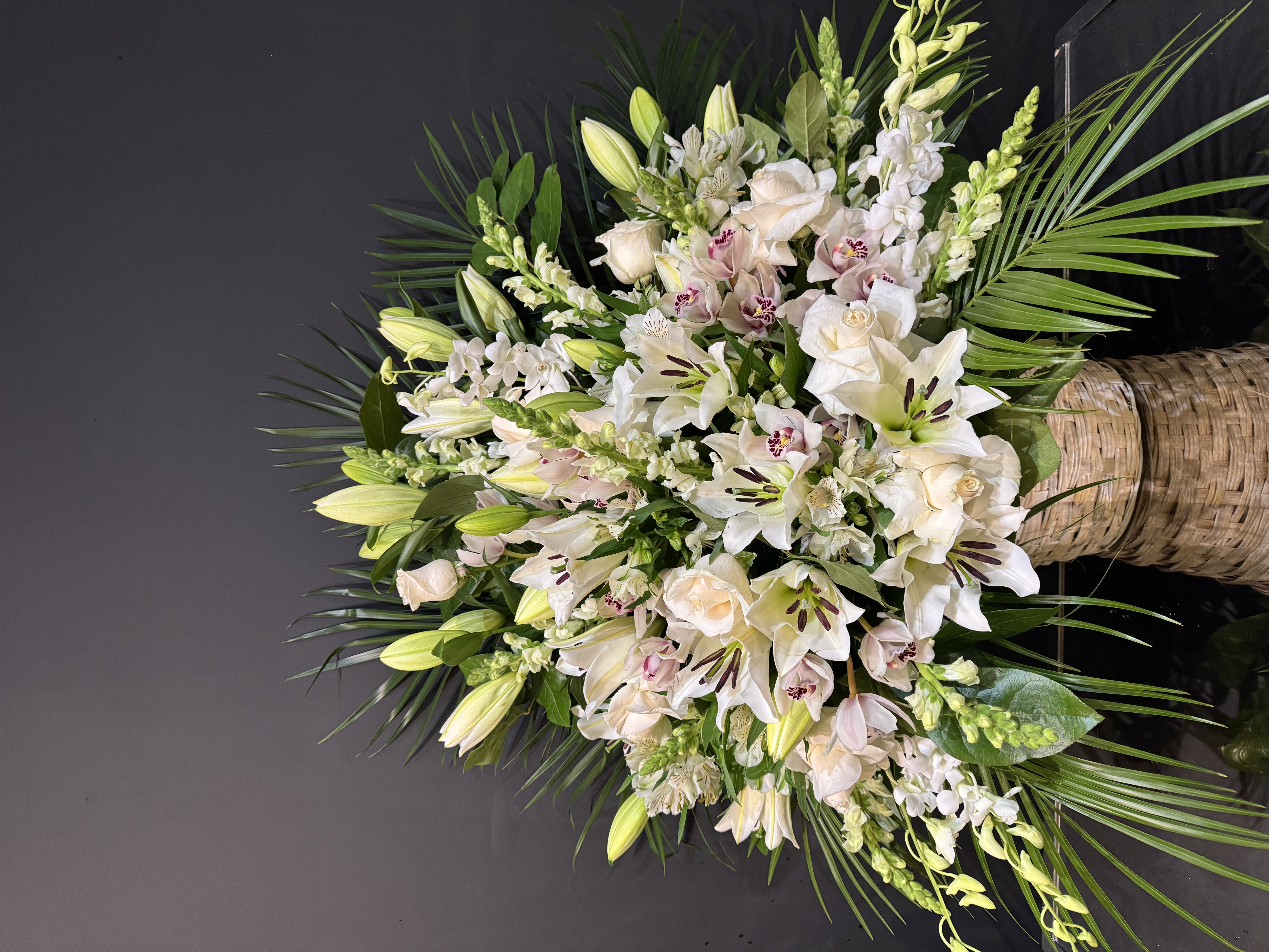 Velvet dawn rose bouquet with dusty rose and cream tones wrapped in silk