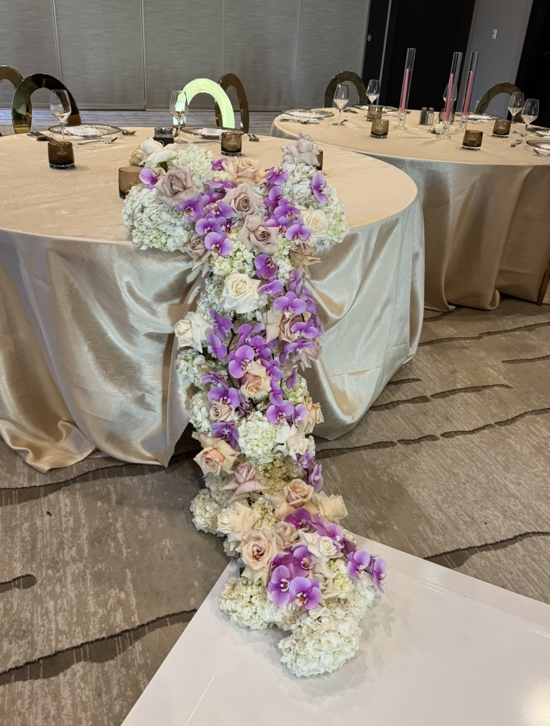 Soft blush and cream peony cascade bouquet with romantic lace detail