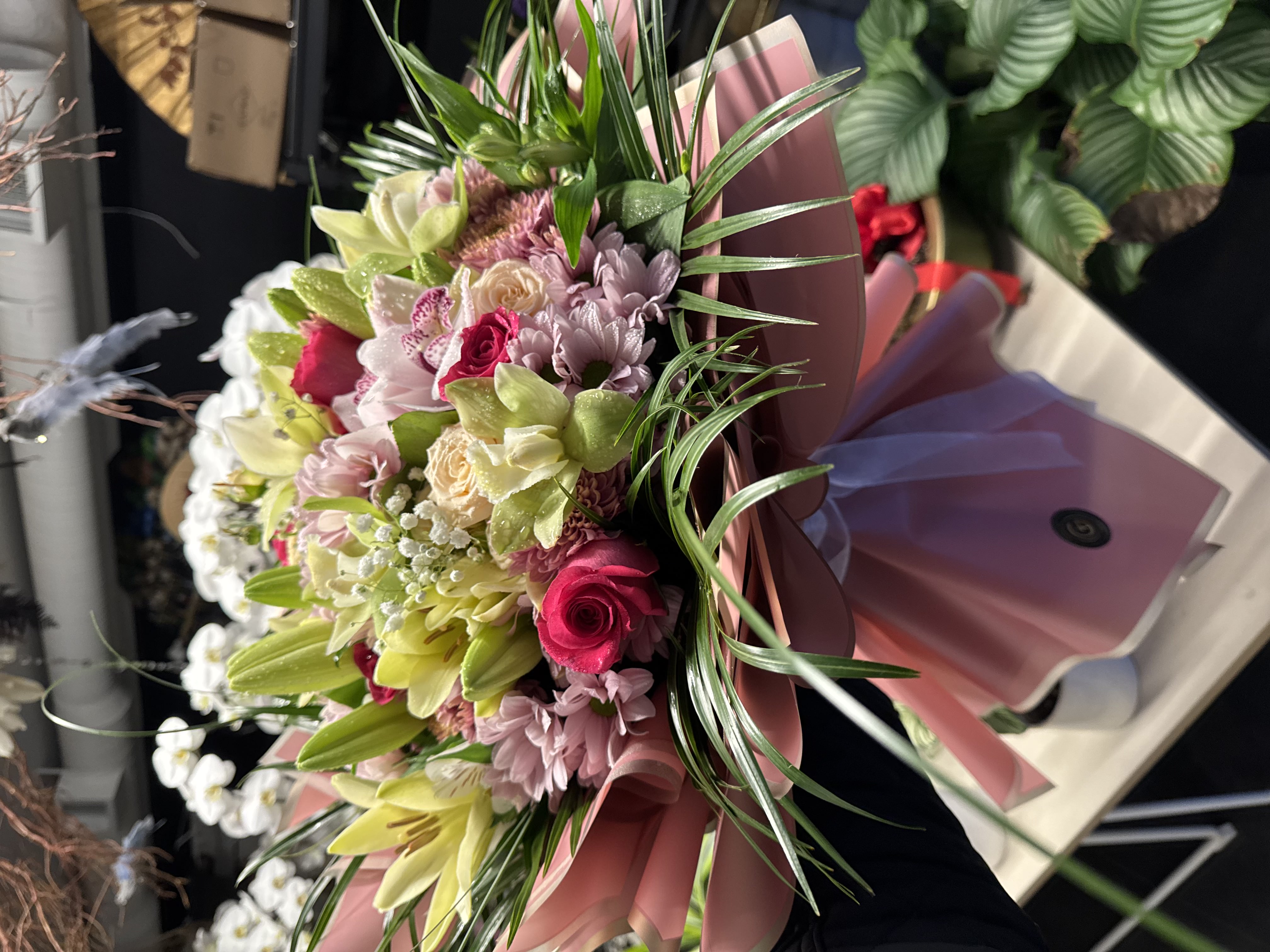 Soft pastel bouquet with peonies and baby breath accents