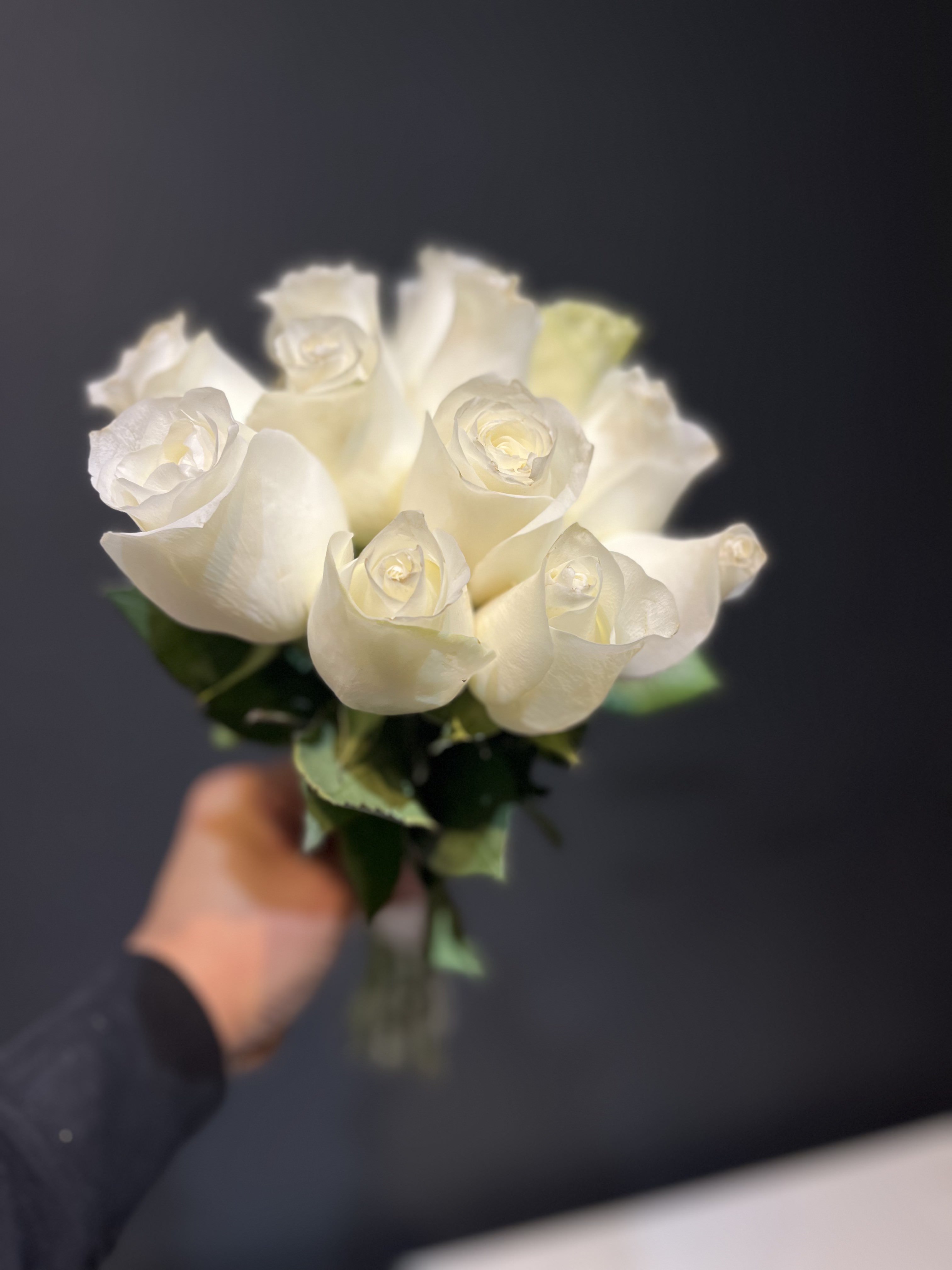 Elegant white and blush rose bouquet with eucalyptus greenery