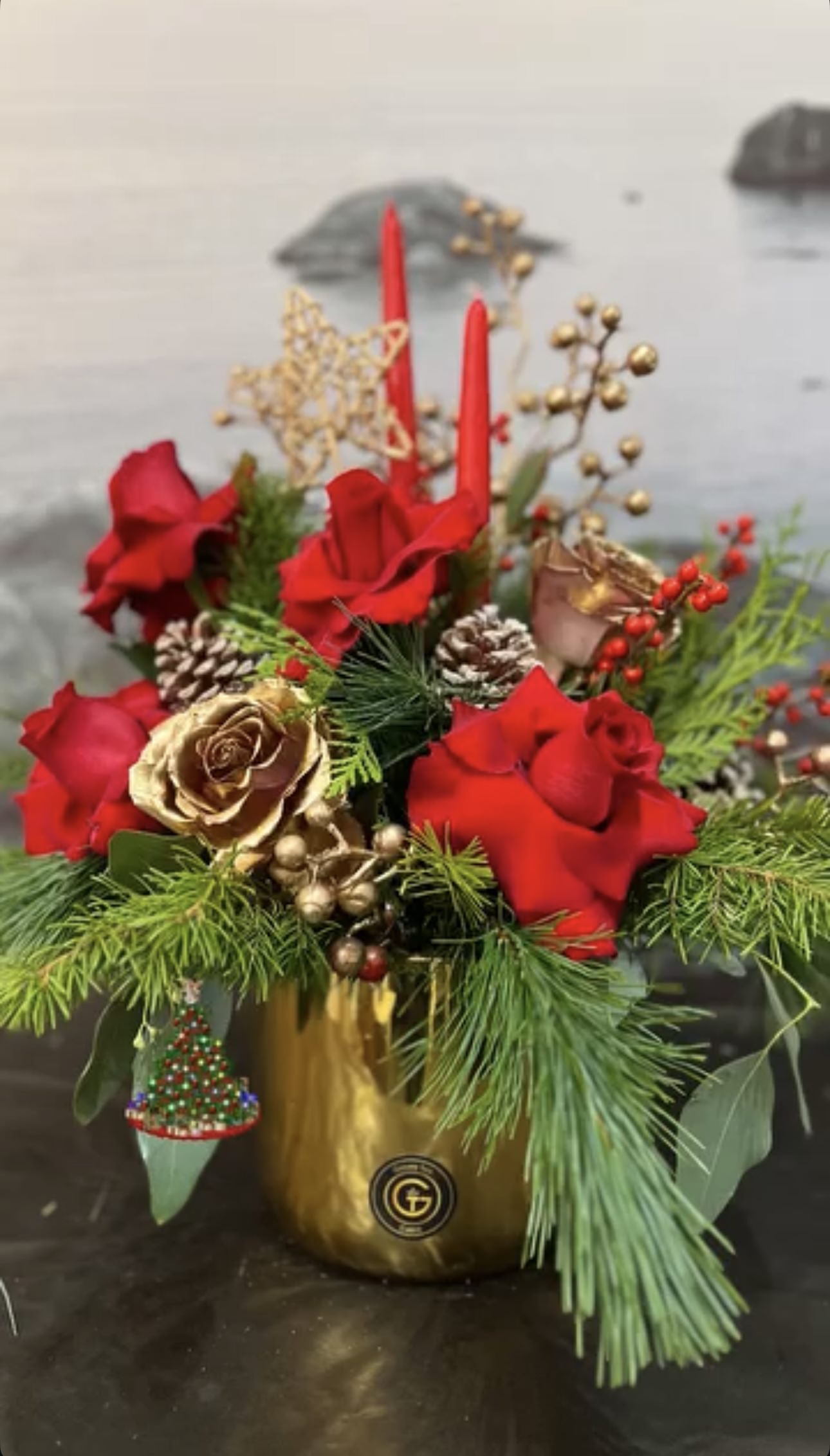 Rustic pine and frosted eucalyptus with subtle golden accents — a cozy Christmas classic