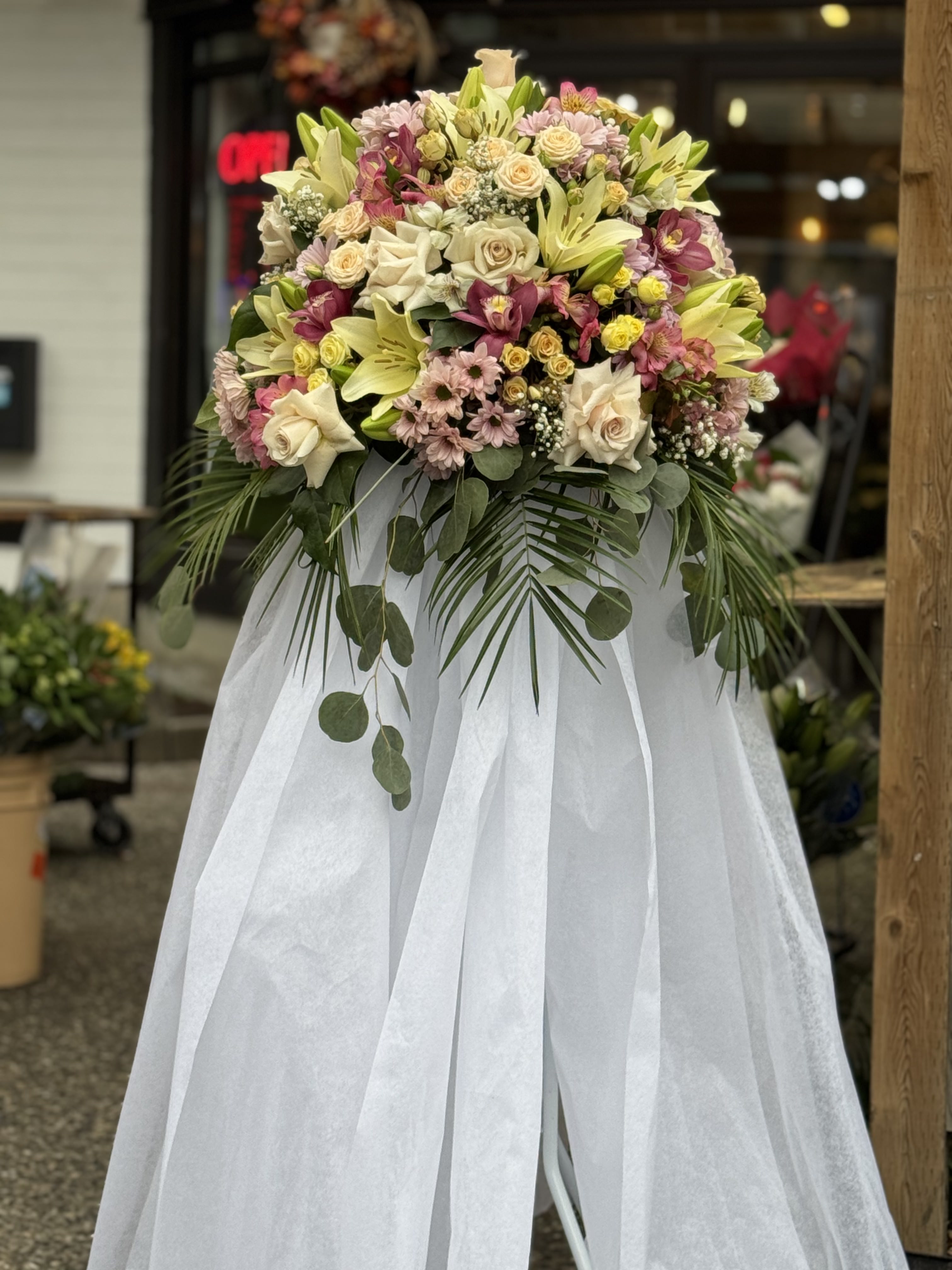 Classic white calla lily and rose bridal posy with pearl accents