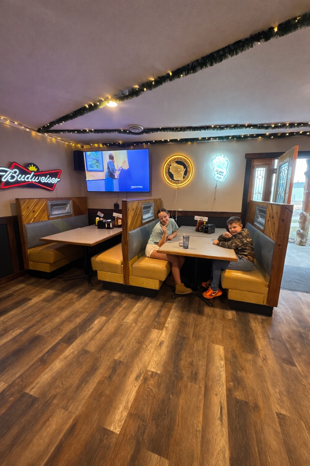 Interior of Tipsy Tee Tavern bar seating area Adams WI