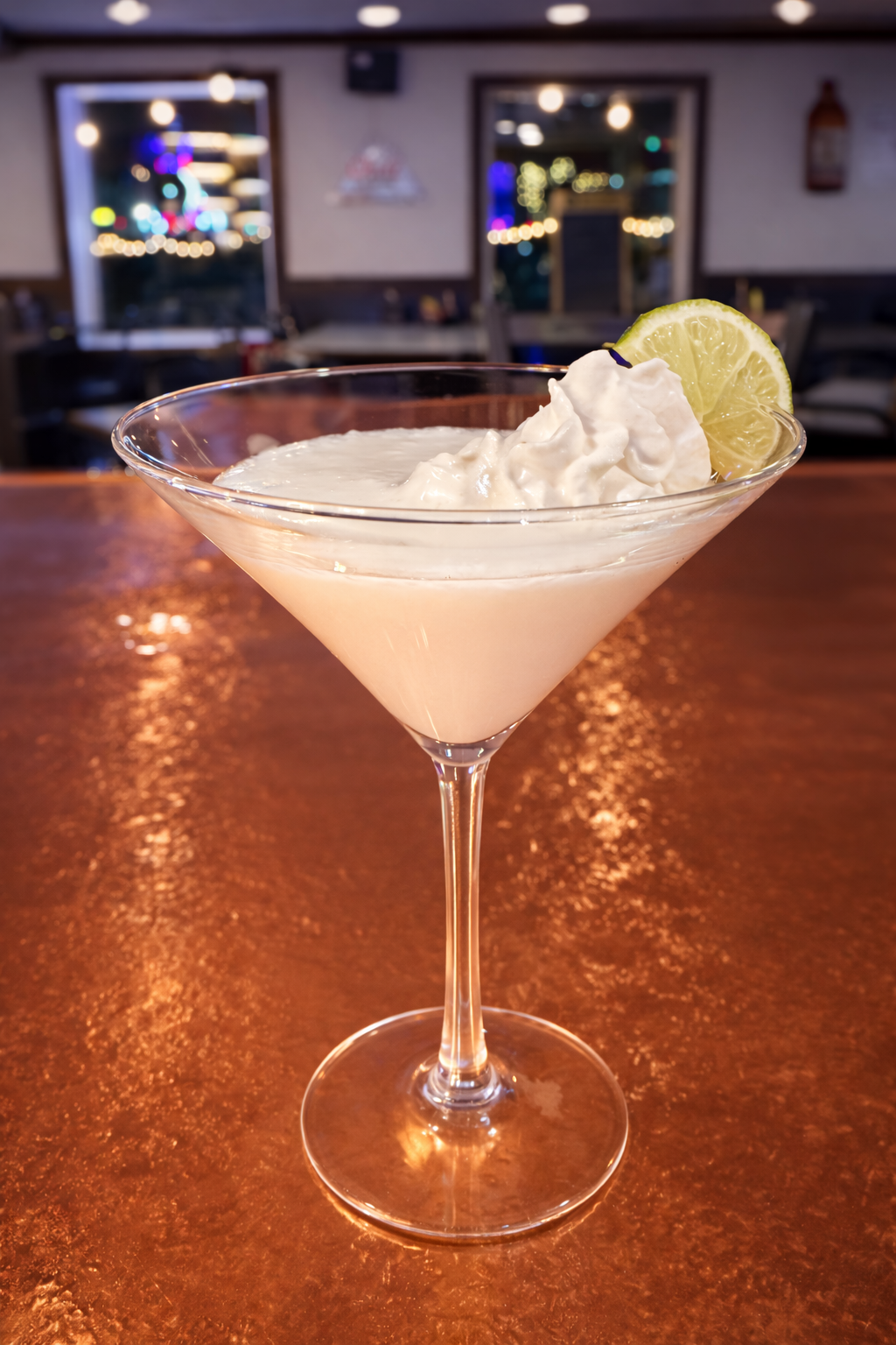 Key Lime Pie Martini craft cocktail — a signature handcrafted martini at Tipsy Tee Tavern in Adams, WI near Castle Rock Lake