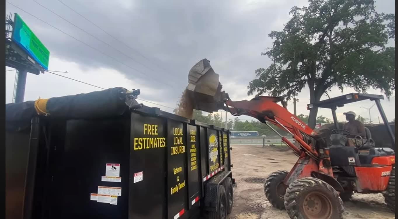 Loaded Down Junk Removal crew at work in Jacksonville Florida