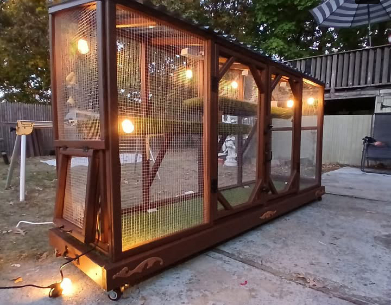 Custom catio designed around an existing deck and garden