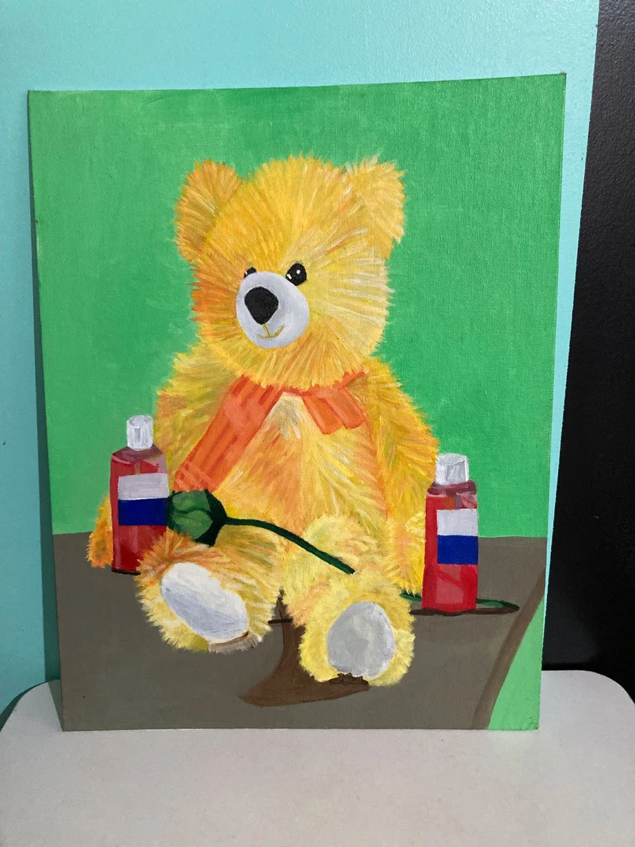 Sunshine Bear, Sand Bottles, and Wooden Rose