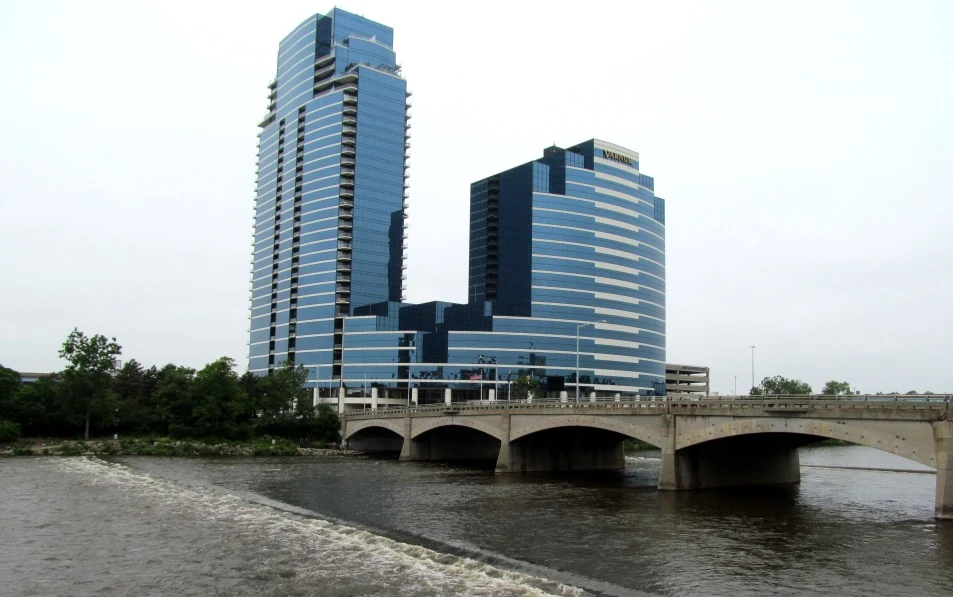 Fast Passport Center office building in Grand Rapids, Michigan — JW Marriott Plaza Towers at 333 Bridge St NW along the Grand River