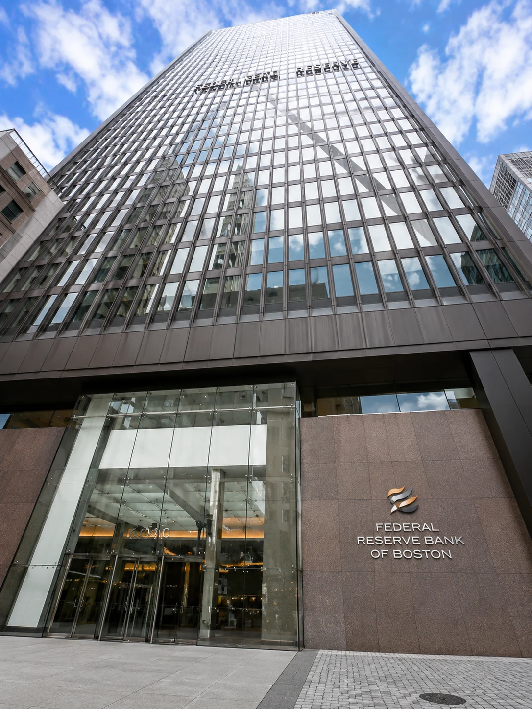 Fast Passport Center Boston office — modern glass high-rise at 1 Boston Place in the Financial District