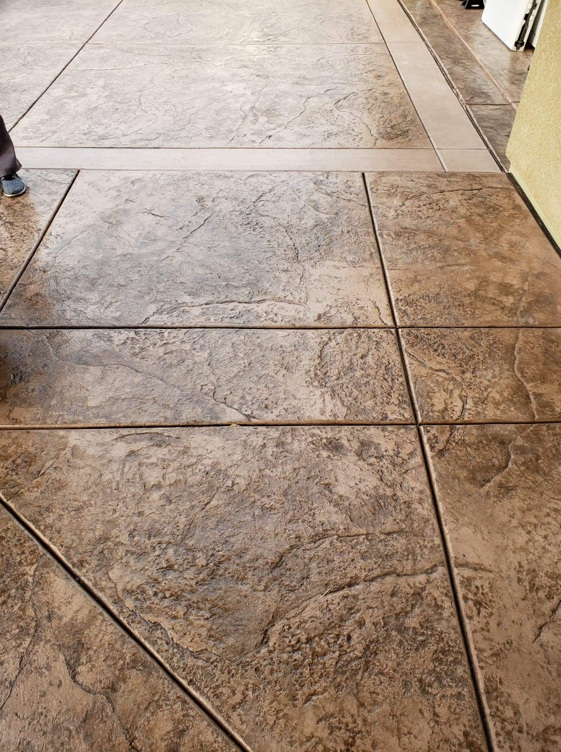 Detailed stamped concrete texture with custom border pattern in Tracy Hills, CA
