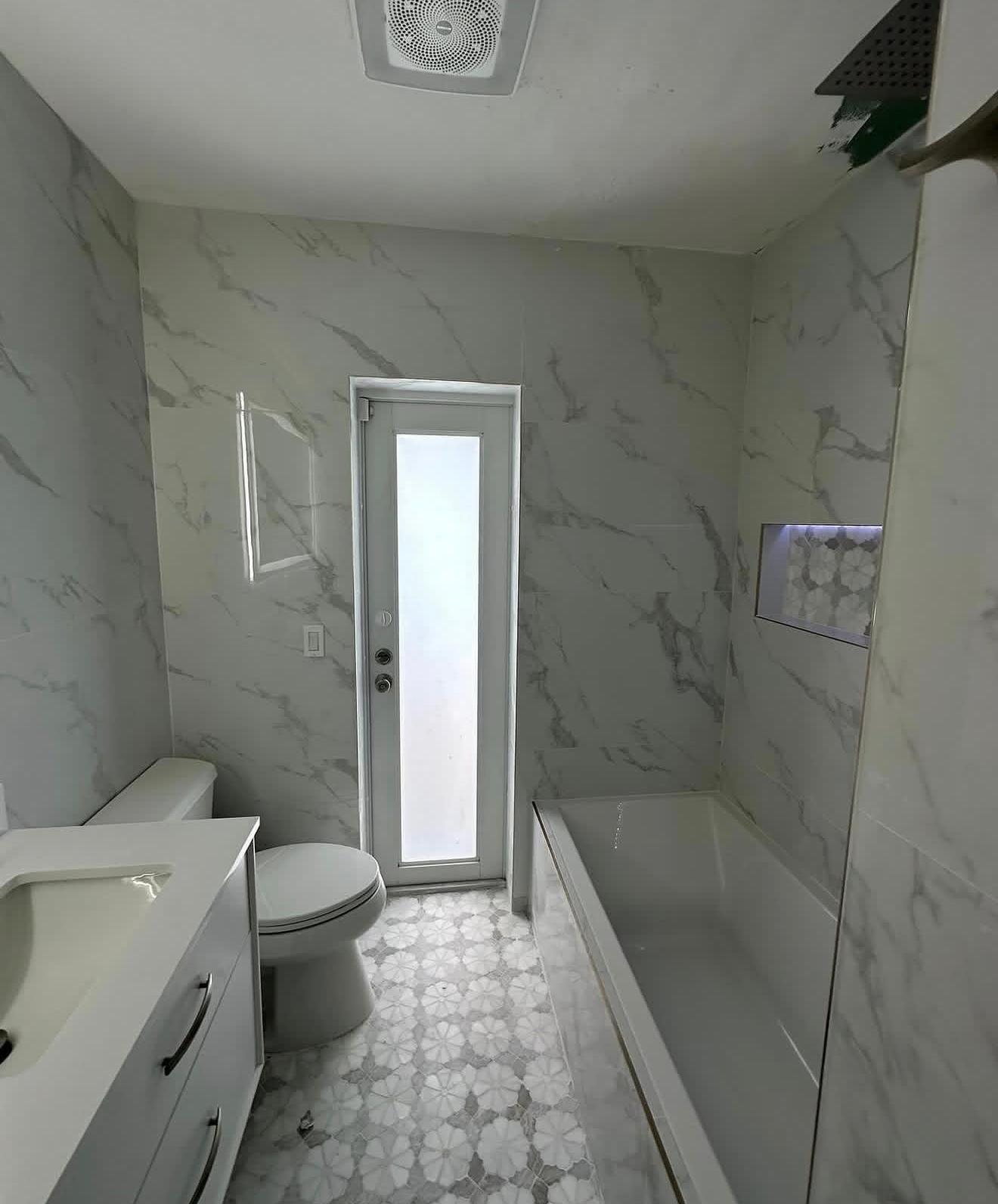 Marble Bath with Mosaic Floor
