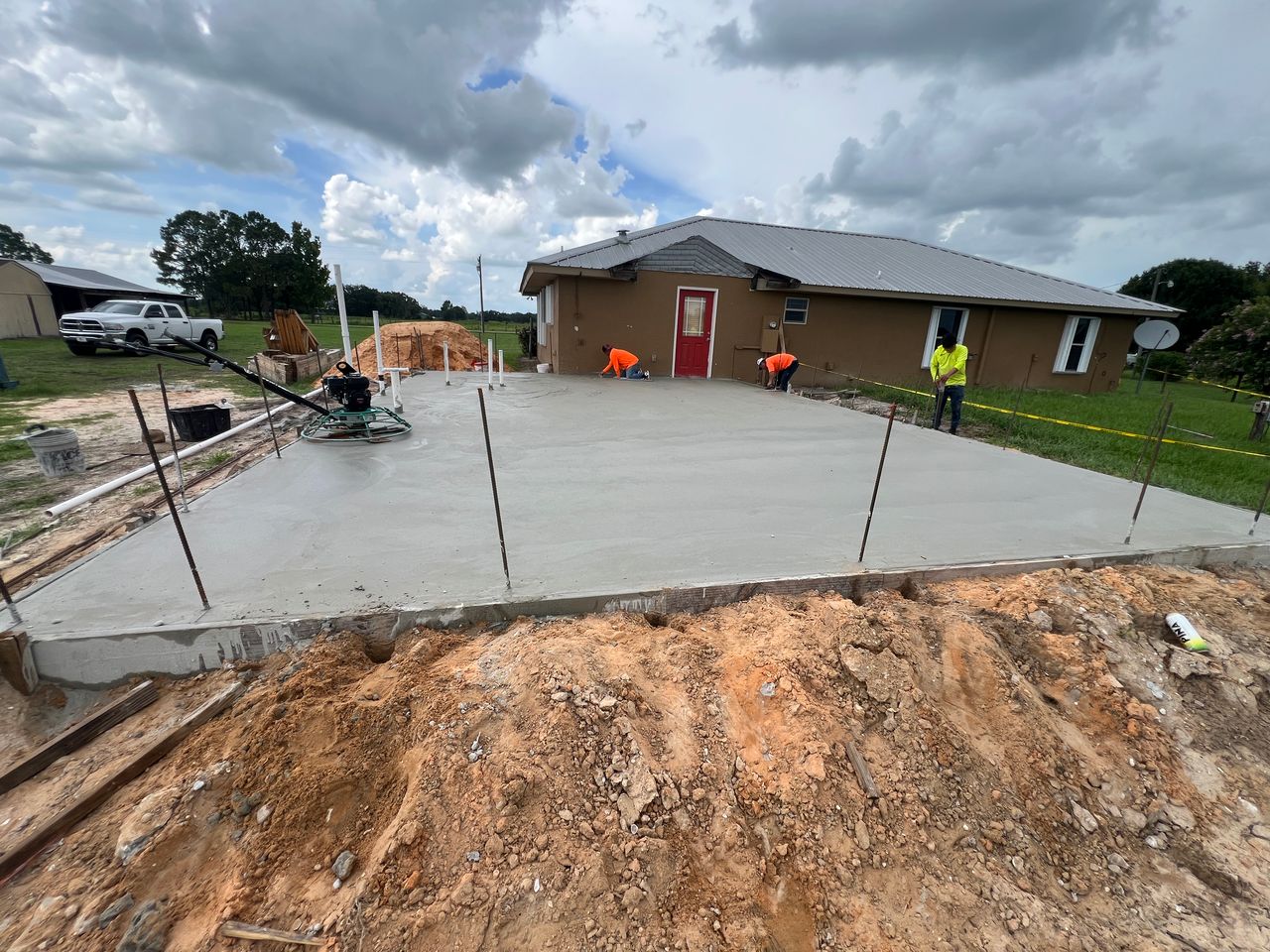 Residential monolithic slab foundation poured by Apex Concrete