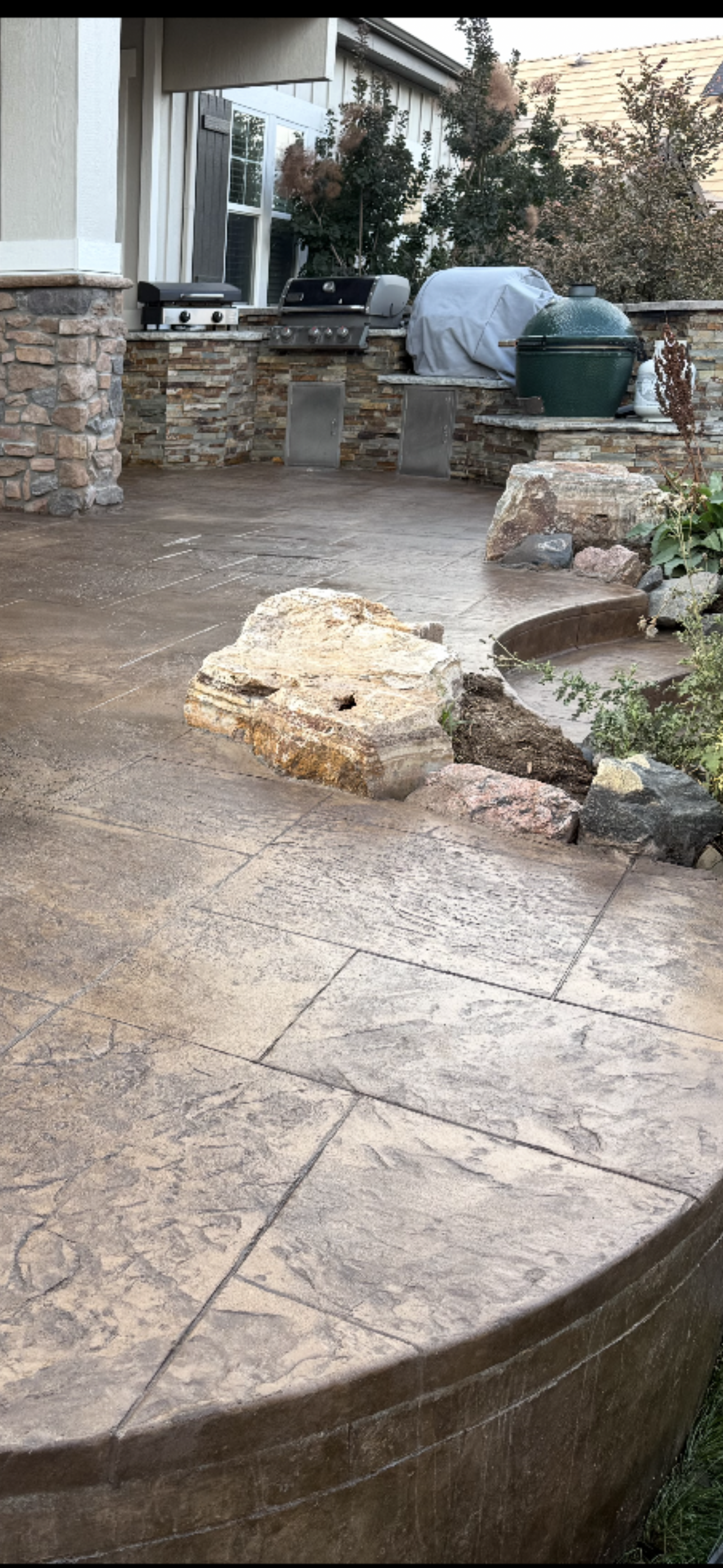 Stamped Patio with Embedded Boulders