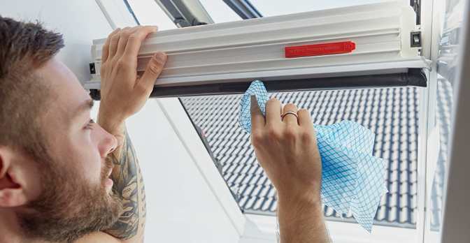 Miami maintenance specialist performing window track cleaning and hardware lubrication