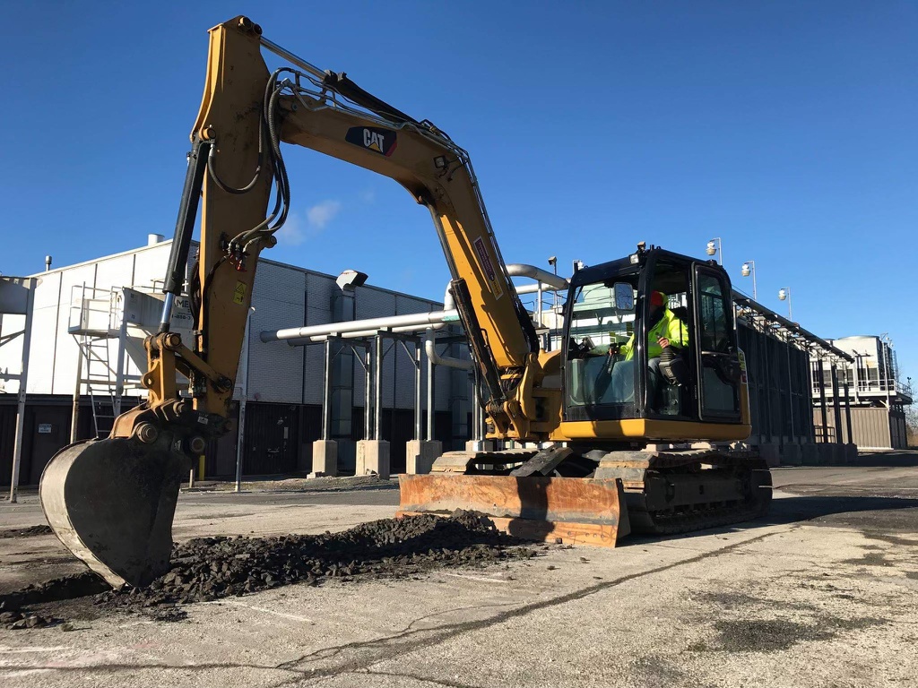 Heavy excavation equipment clearing and grading a commercial site in Pennsylvania