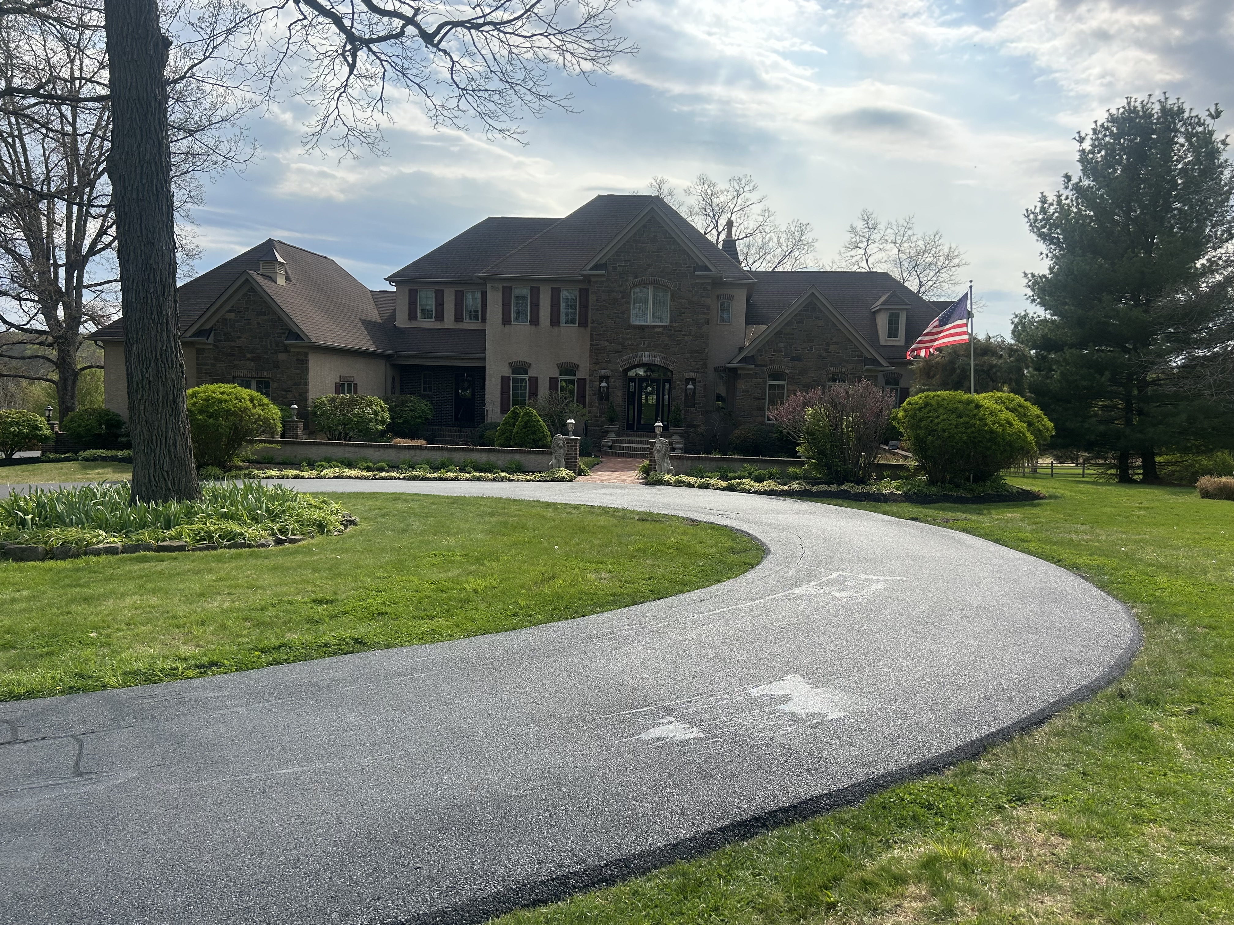 Professional asphalt paving crew at work on a commercial project in Pennsylvania
