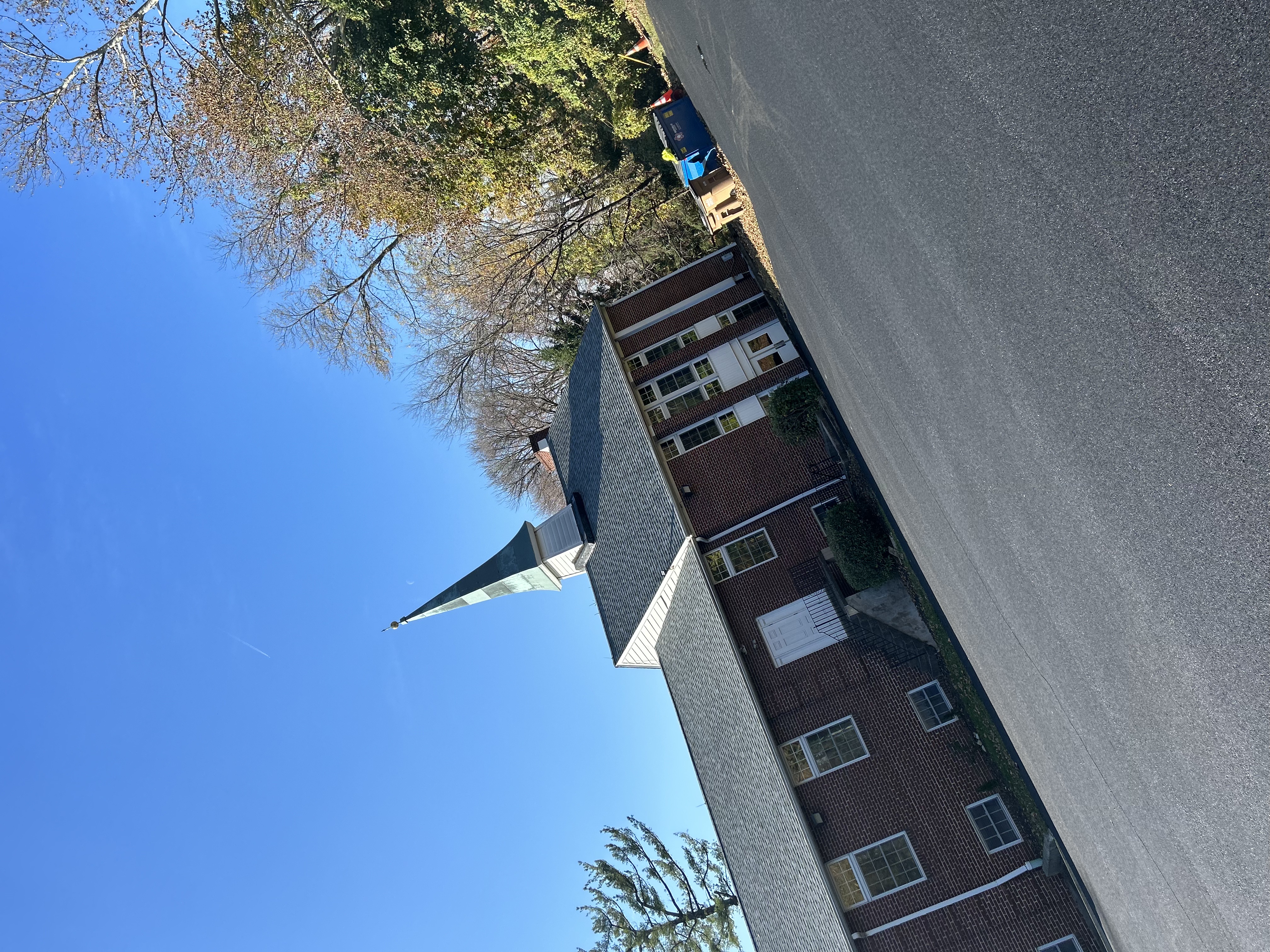 Heavy equipment placing commercial asphalt surface