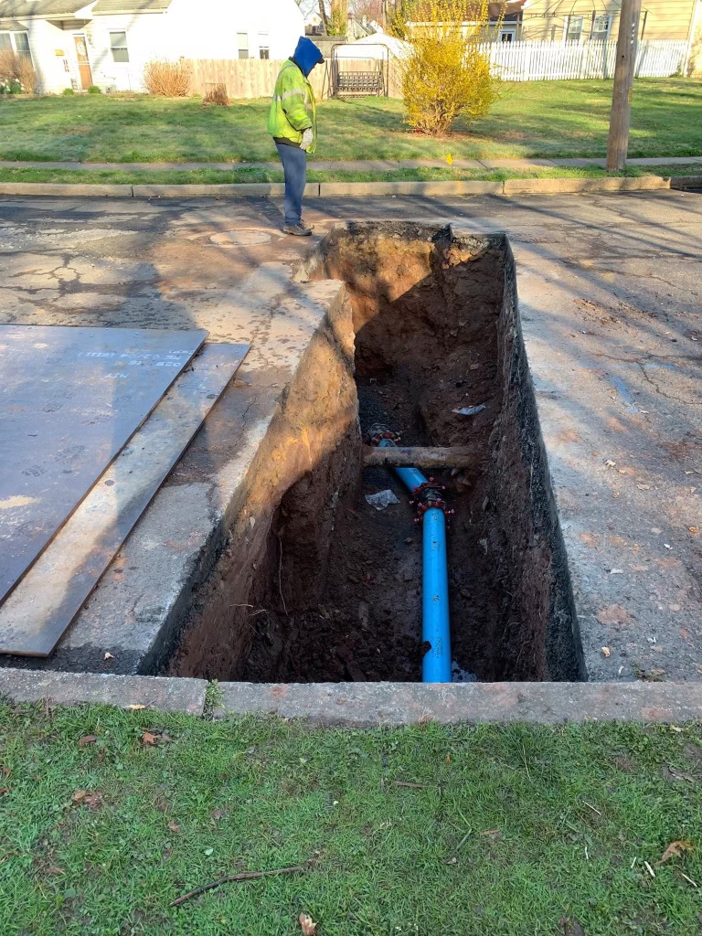Excavation and grading equipment preparing a commercial building pad