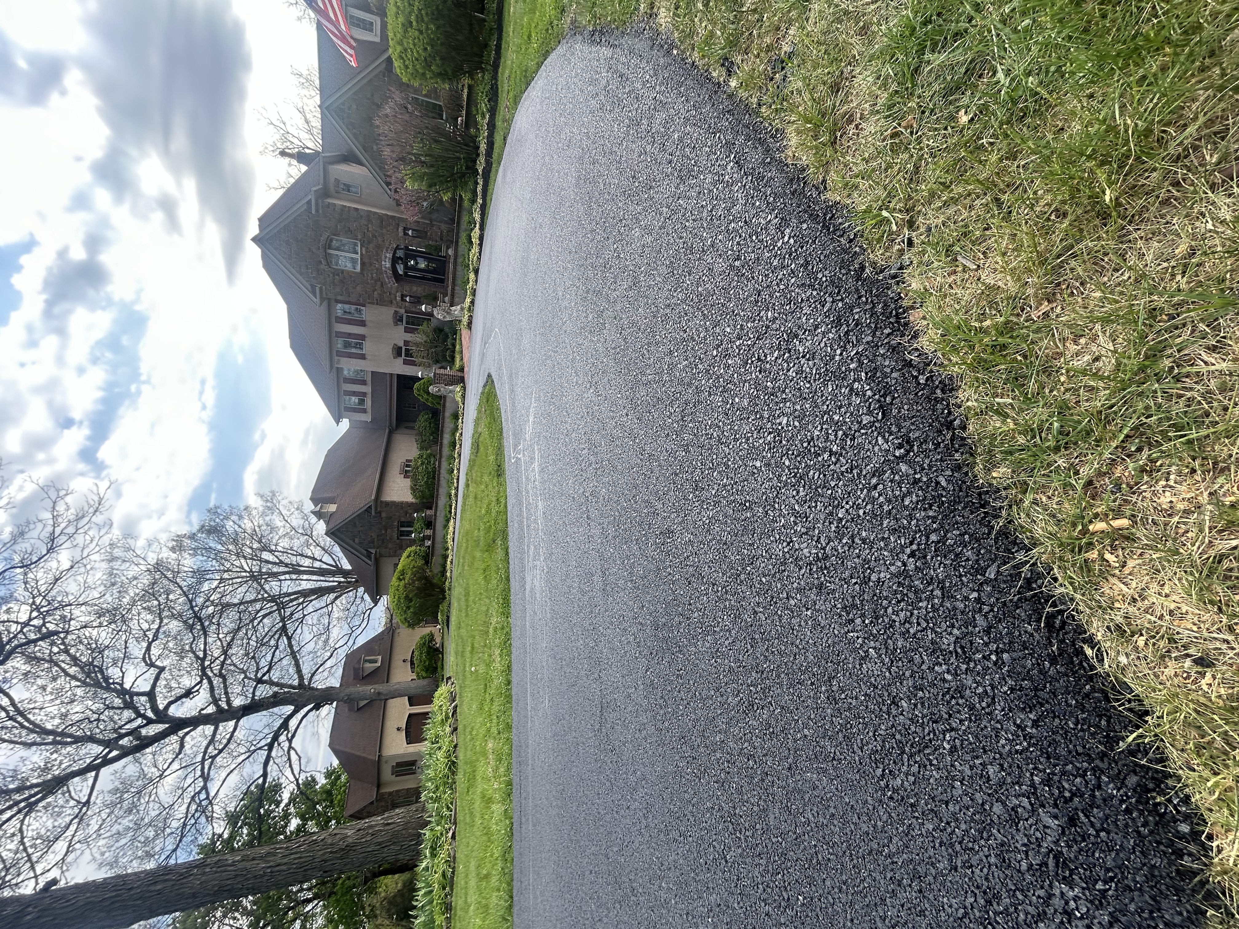 Commercial concrete curb and gutter installation with forms in place