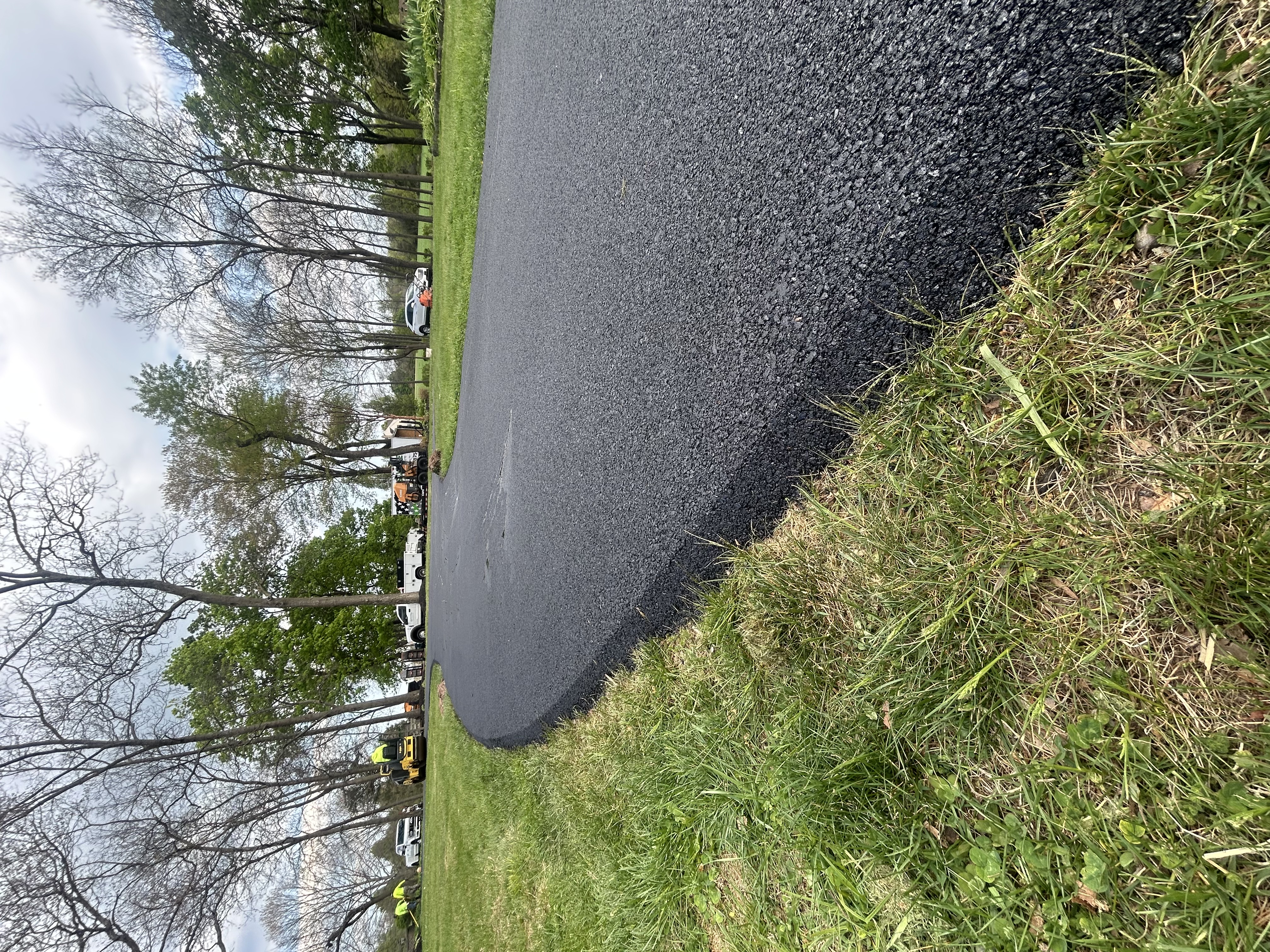 Municipal sidewalk reconstruction with fresh concrete and expansion joints