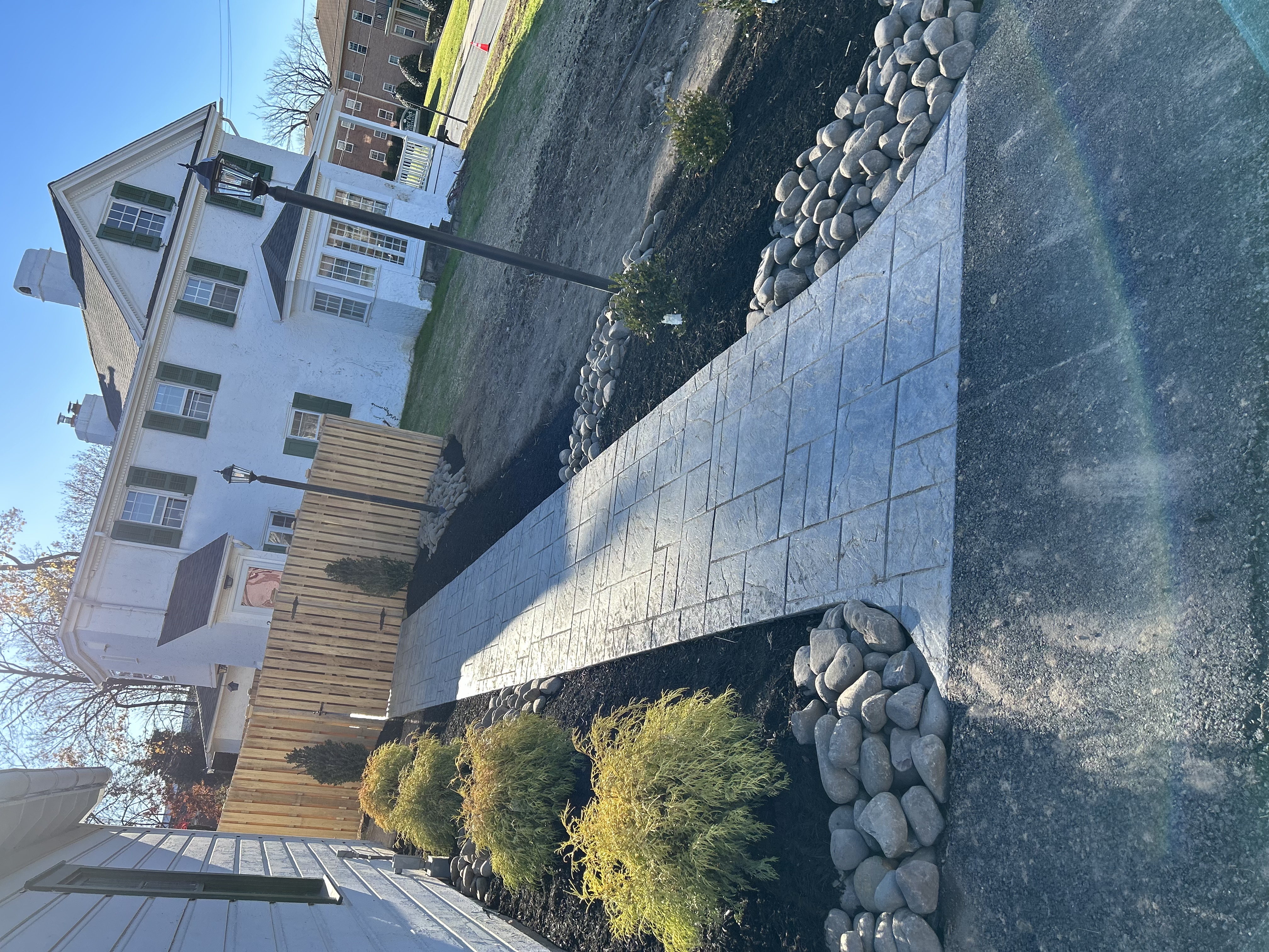 Custom stamped concrete pool deck with slip-resistant sealer