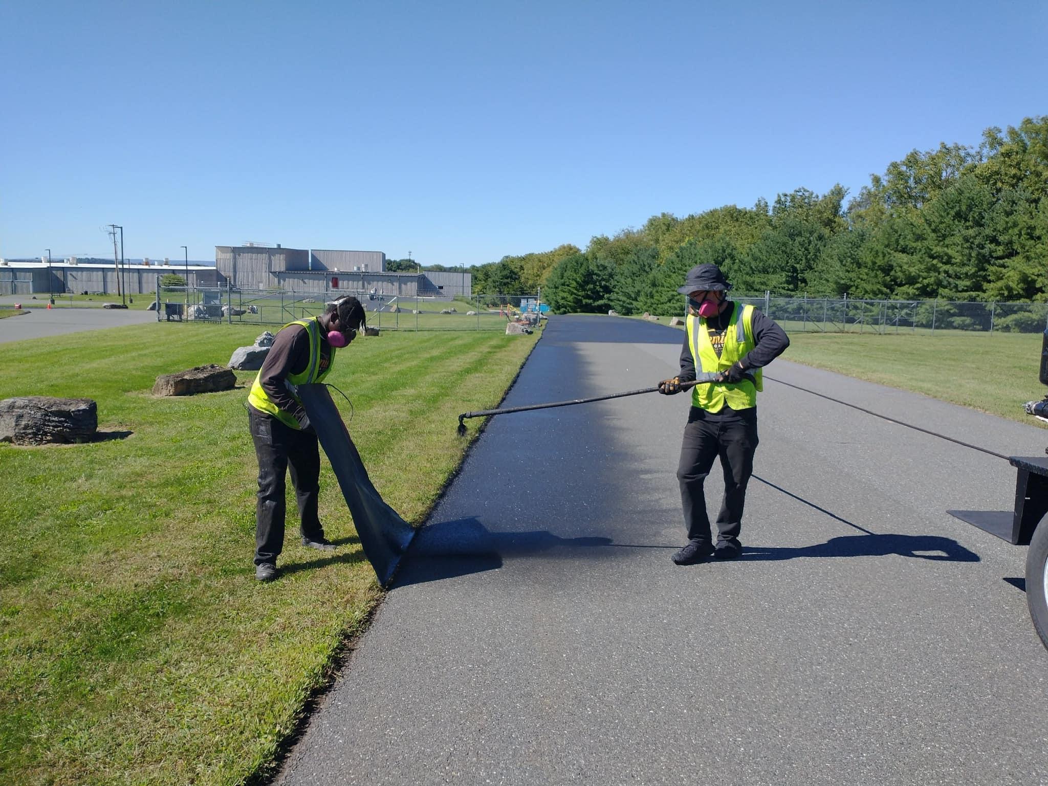 Fresh commercial asphalt surface after completion