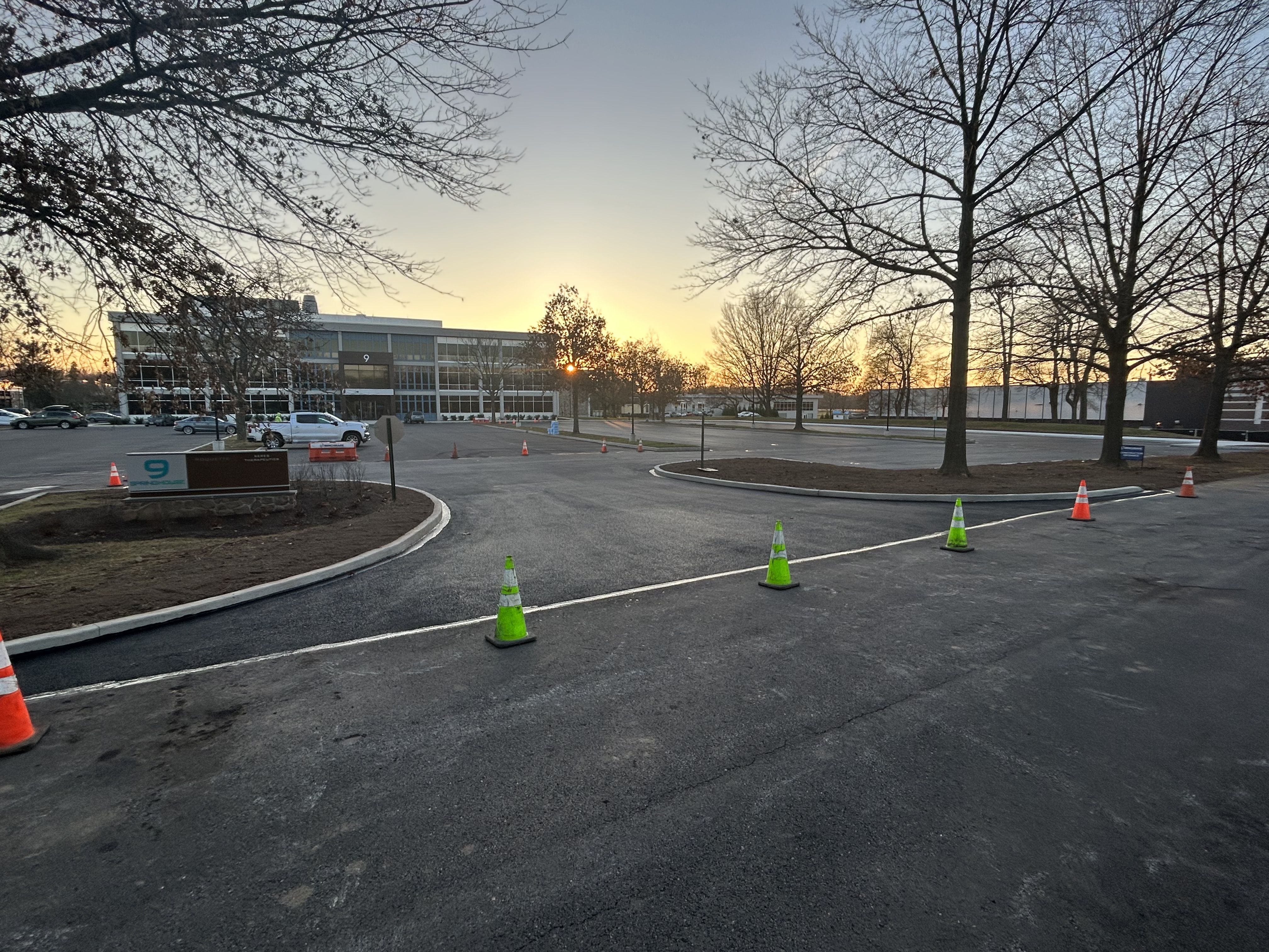 Close-up of commercial asphalt roller smoothing surface
