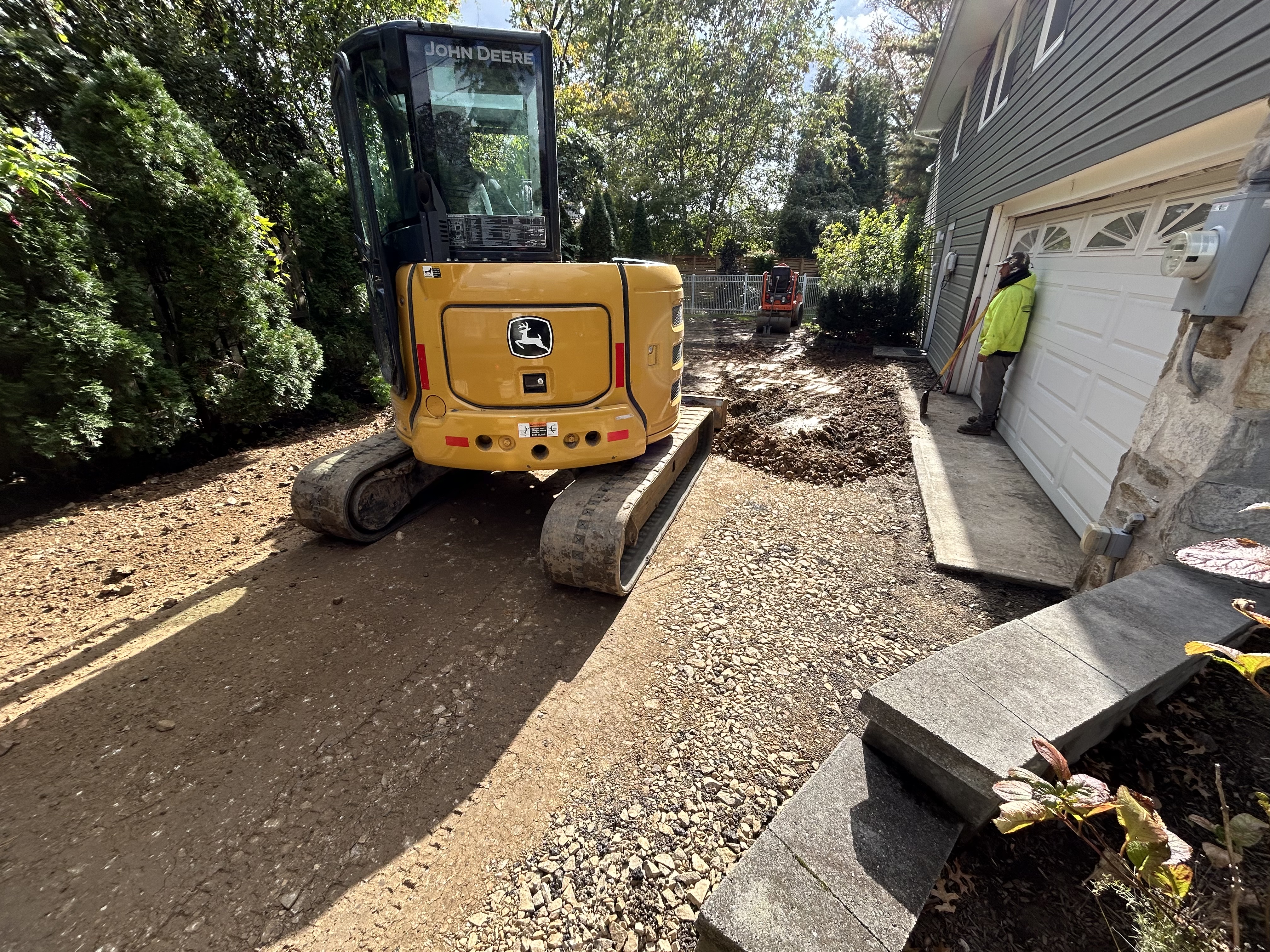 Residential property with newly paved asphalt driveway