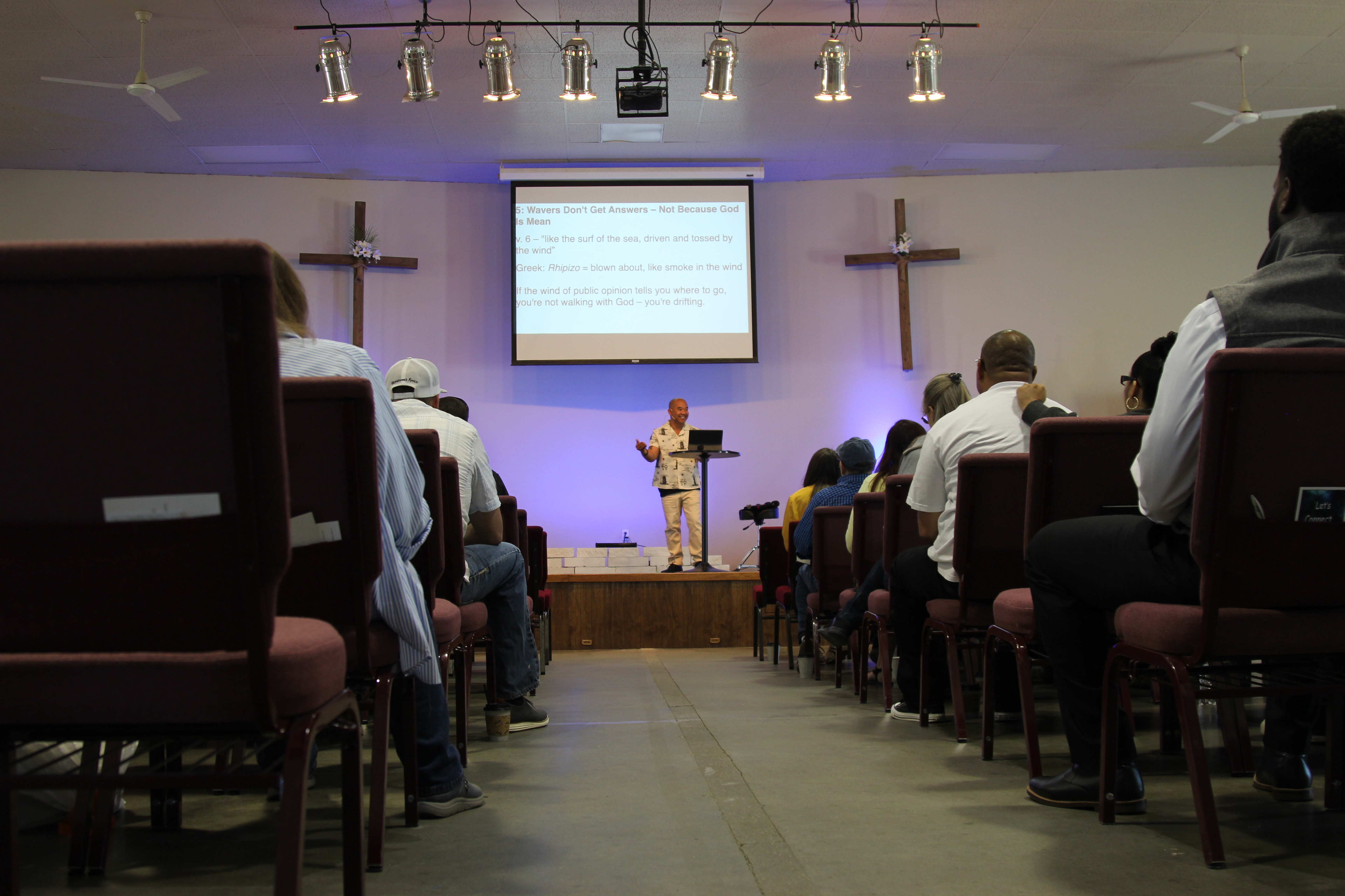 Pastor preaching at 1Love Christian Church Sunday service Bible teaching in Boise