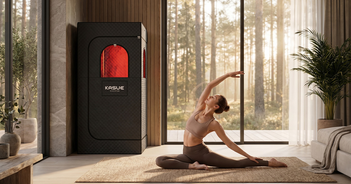 Woman relaxing in portable red light sauna tent at home