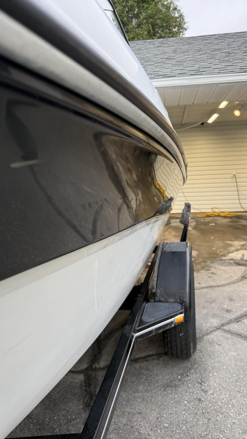 Restored boat hull after gelcoat restoration