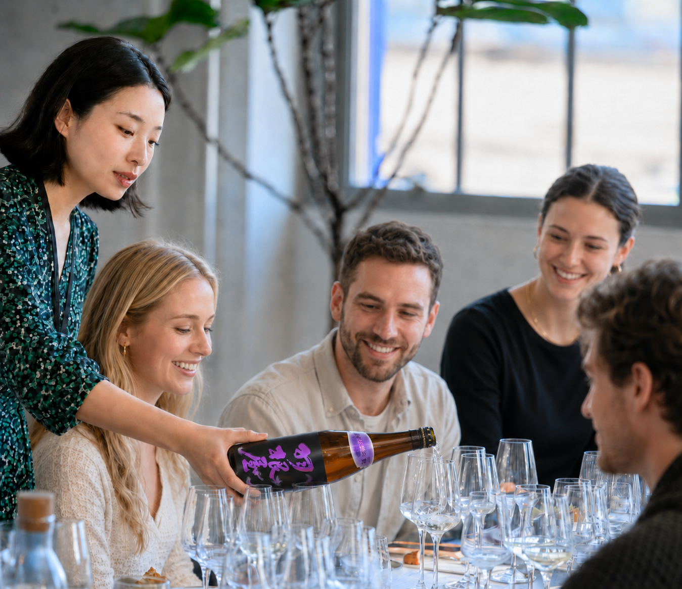 Premium sake bottles and tasting cups