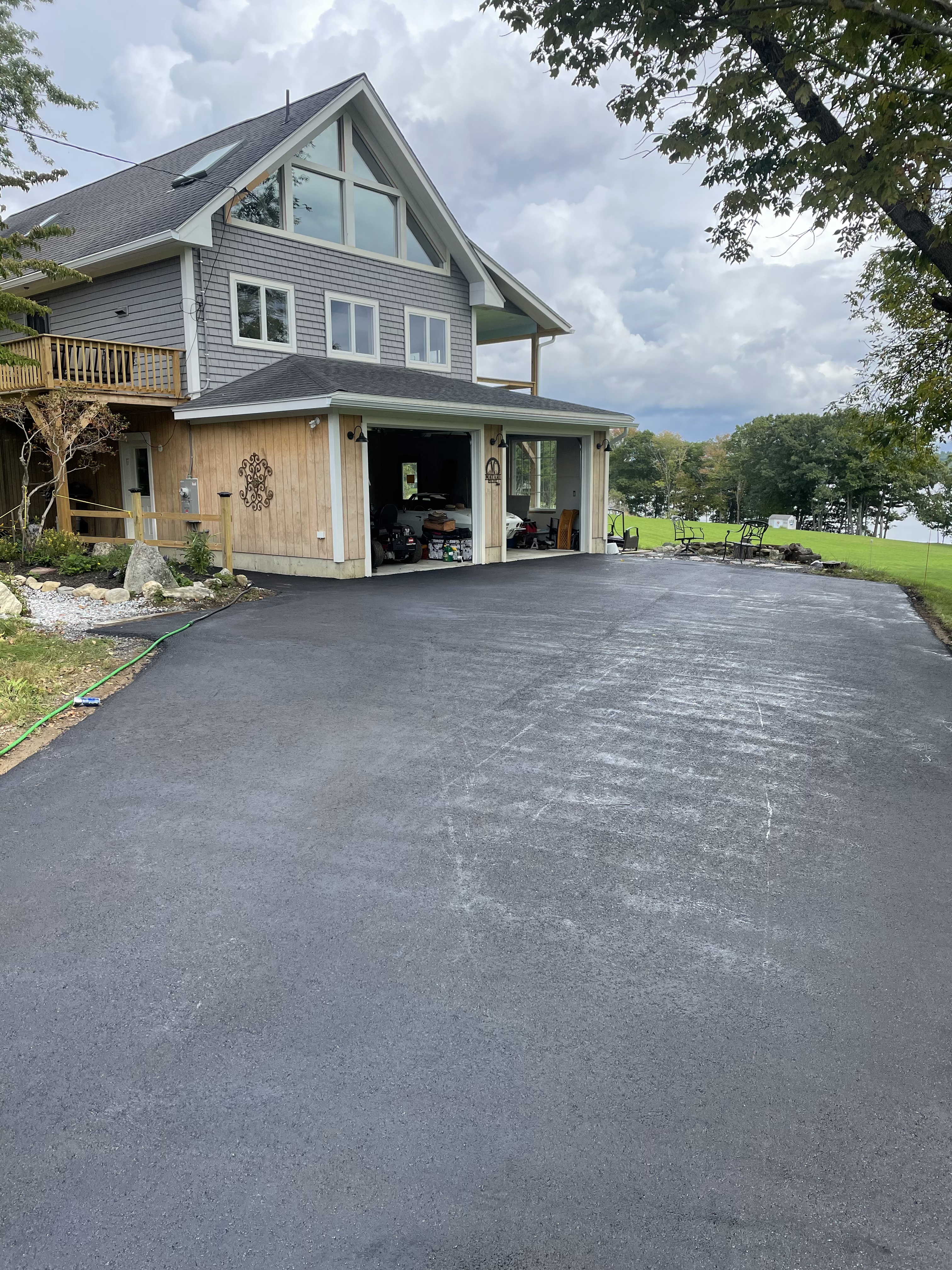 Beautiful new asphalt driveway installation completed in Boxford, MA