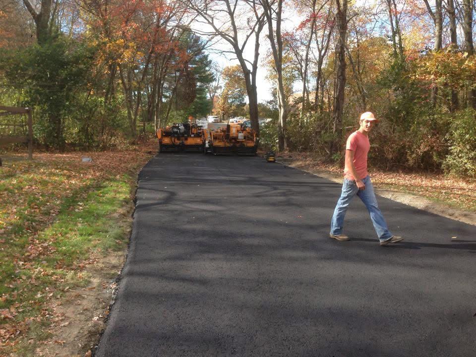 Completed residential asphalt driveway project in Massachusetts