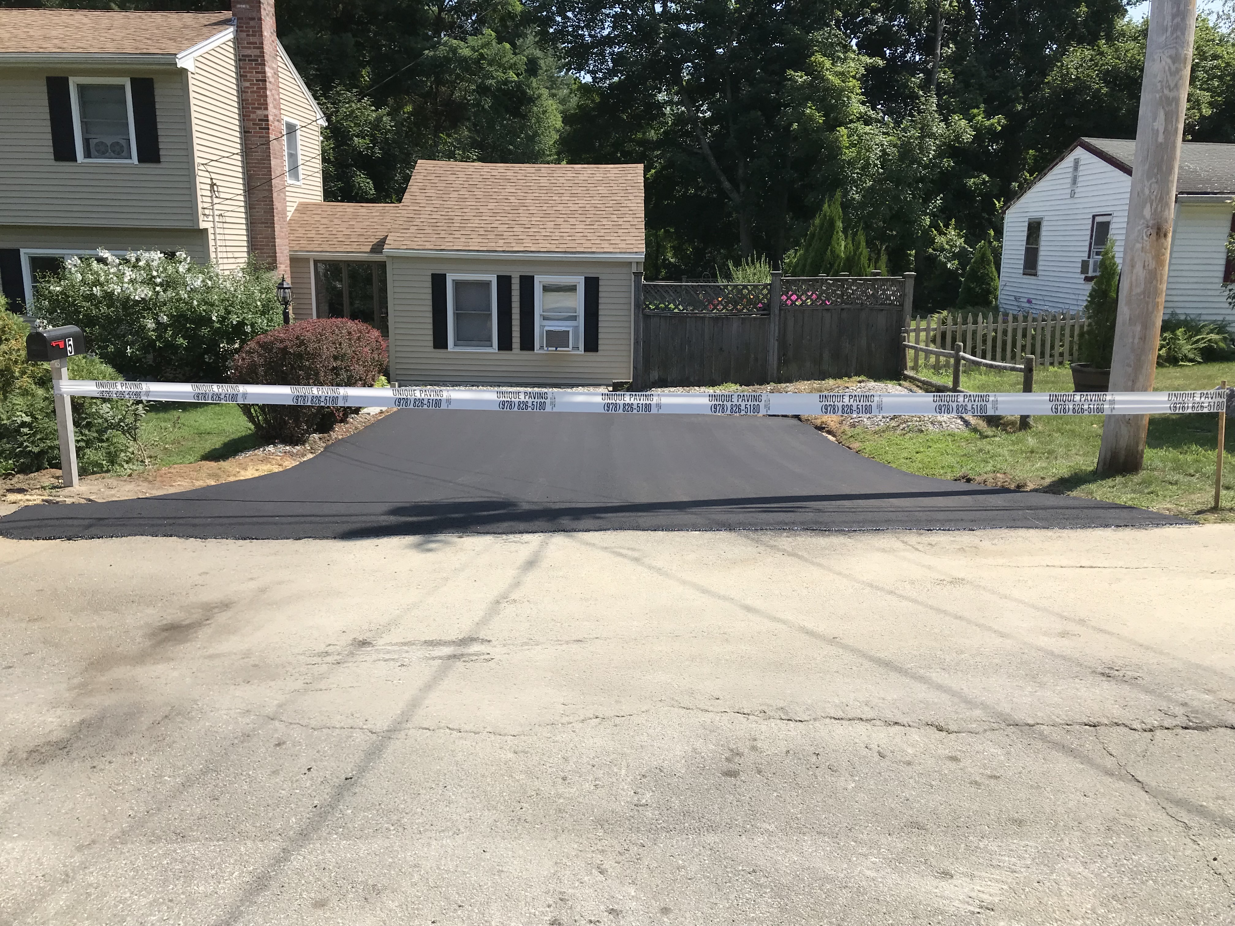 Private road paving project surface work in Boxford, MA