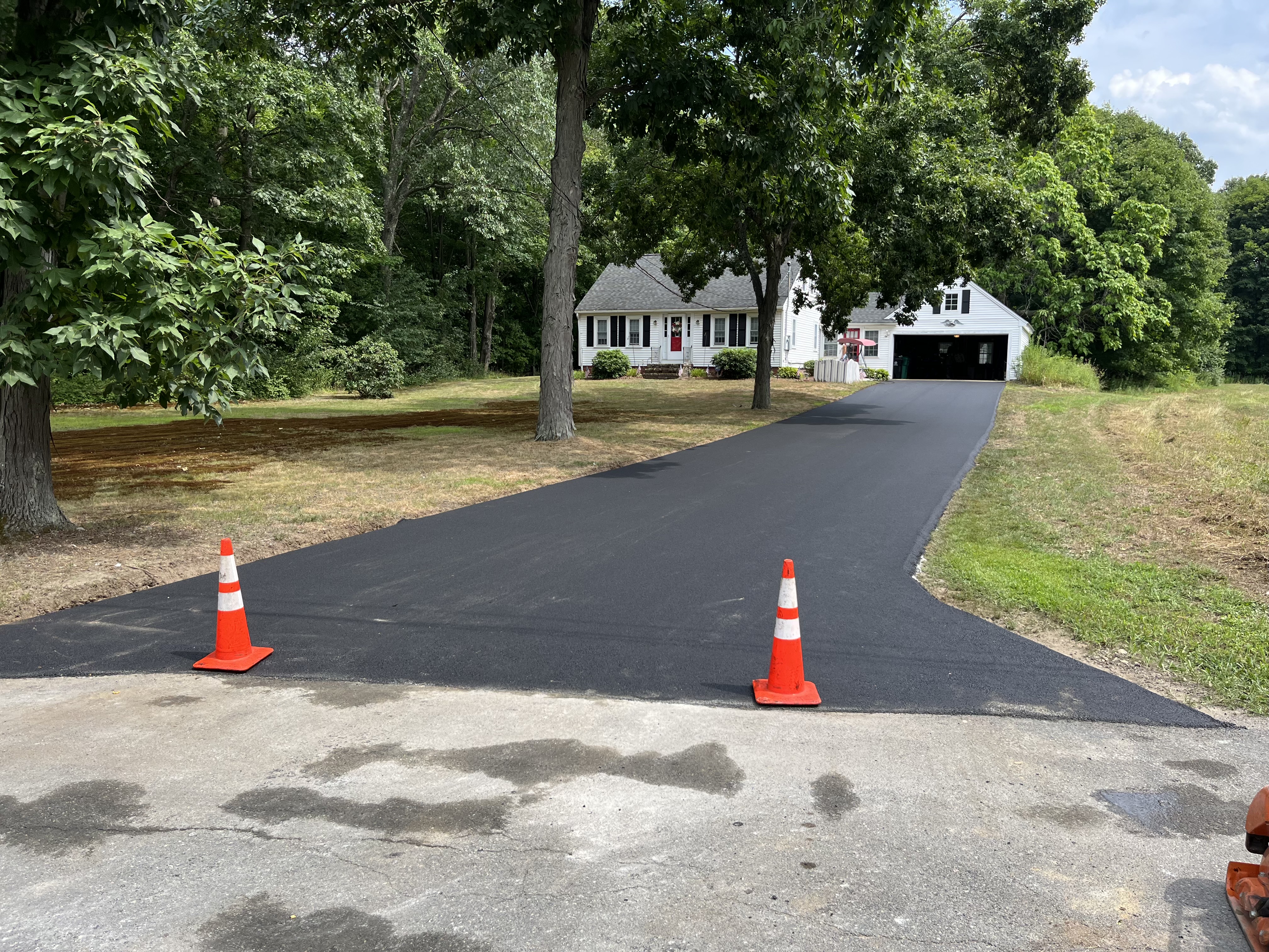 After: Beautiful new asphalt driveway replacement completed in Boxford, MA