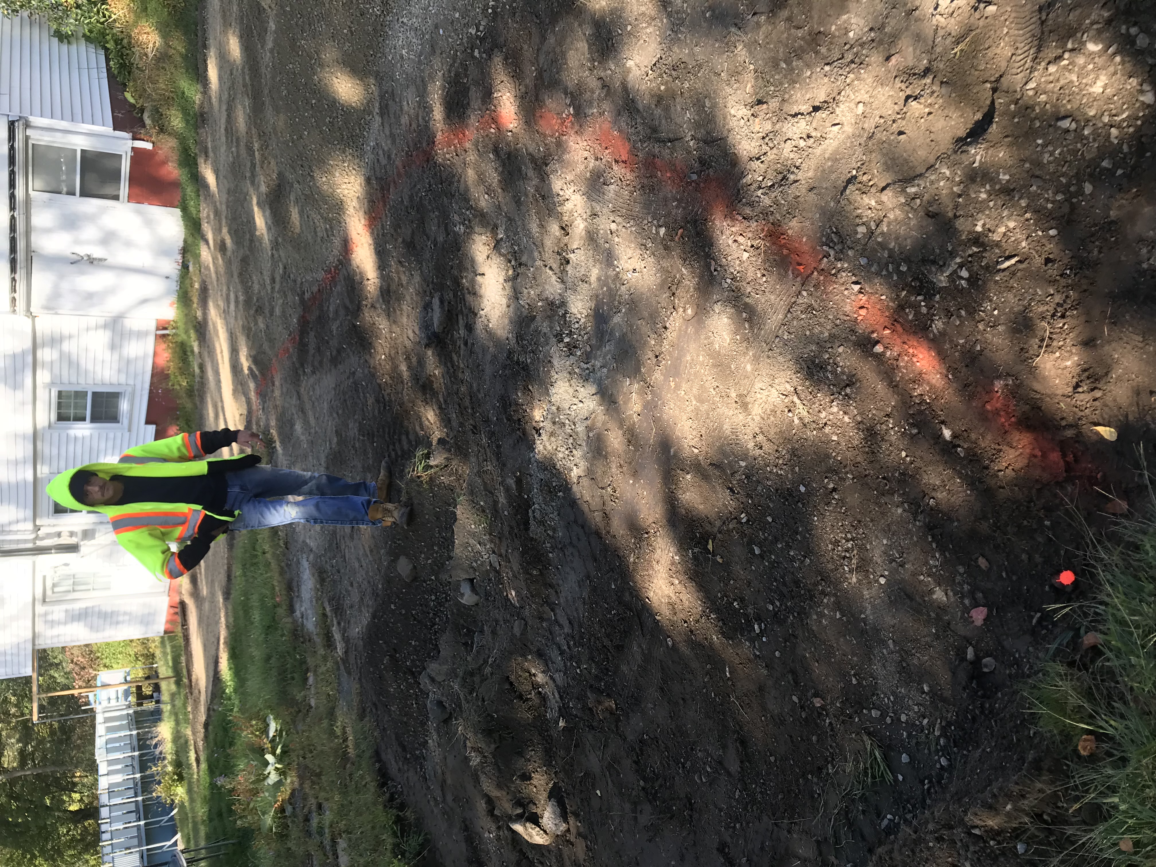 Before: Old cracked driveway in Merrimac, MA — full driveway replacement by Unique Asphalt Paving