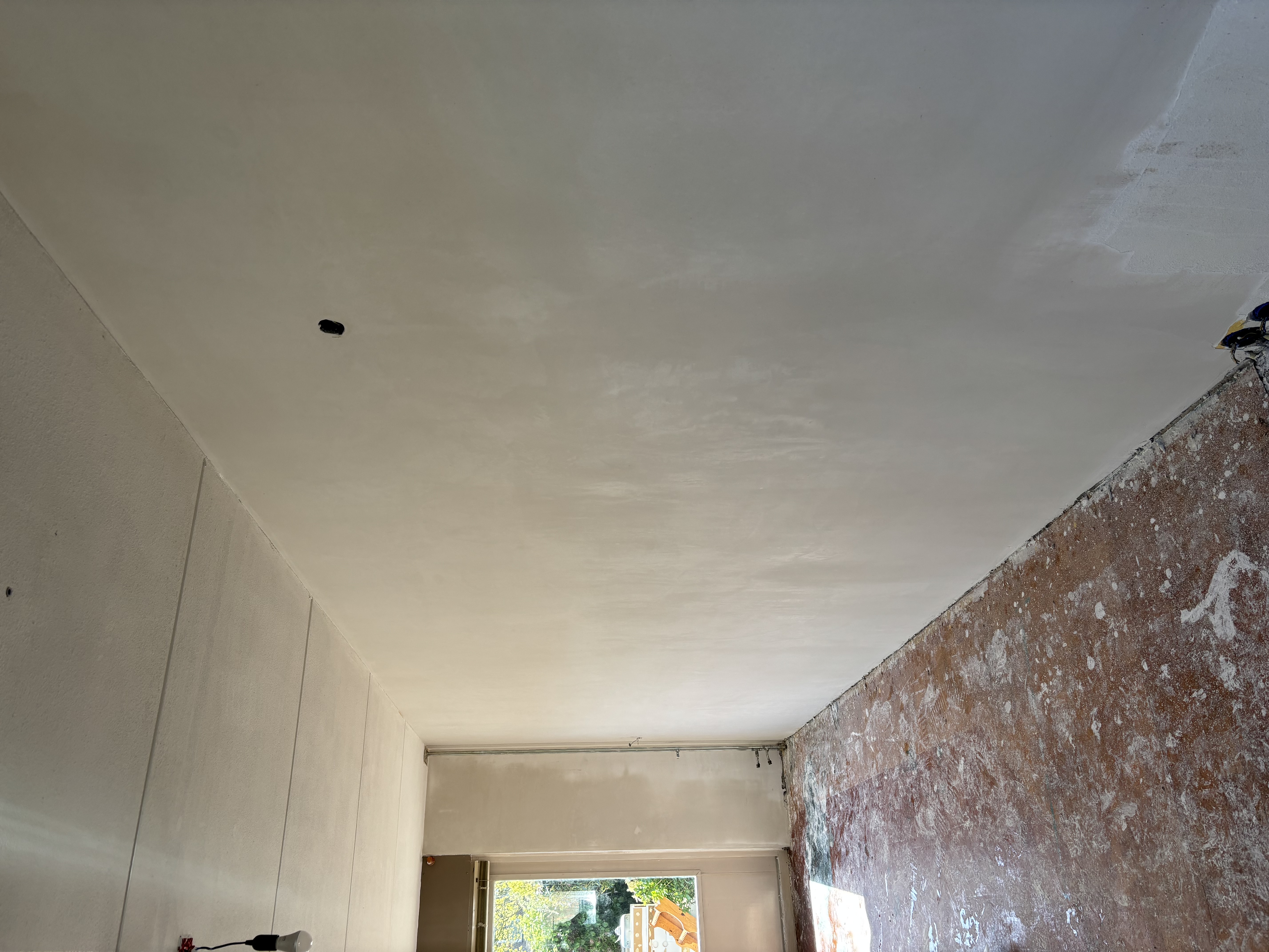 Na — Woonkamer muren
