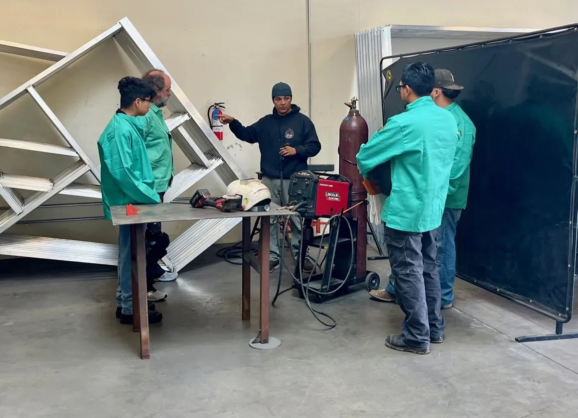 JPW welding workshop students learning