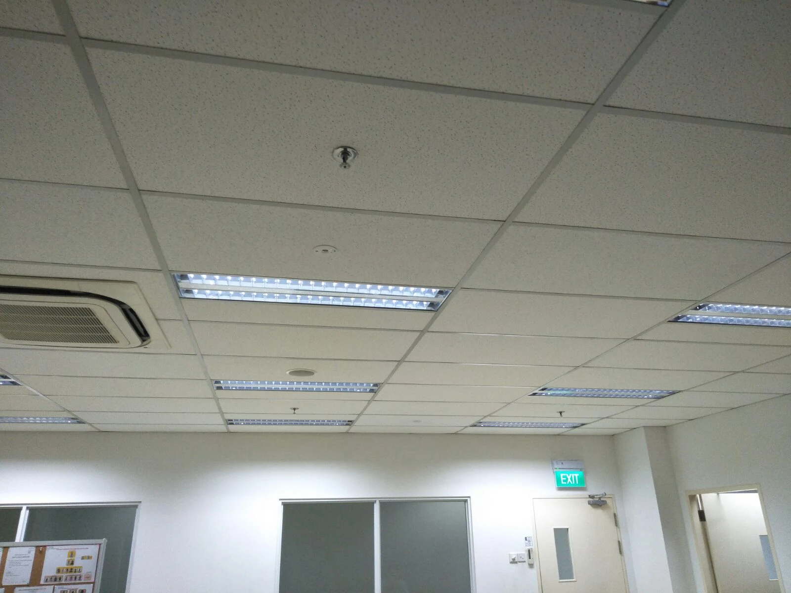 Office fire safety ceiling with sprinkler exit lights and AC Singapore