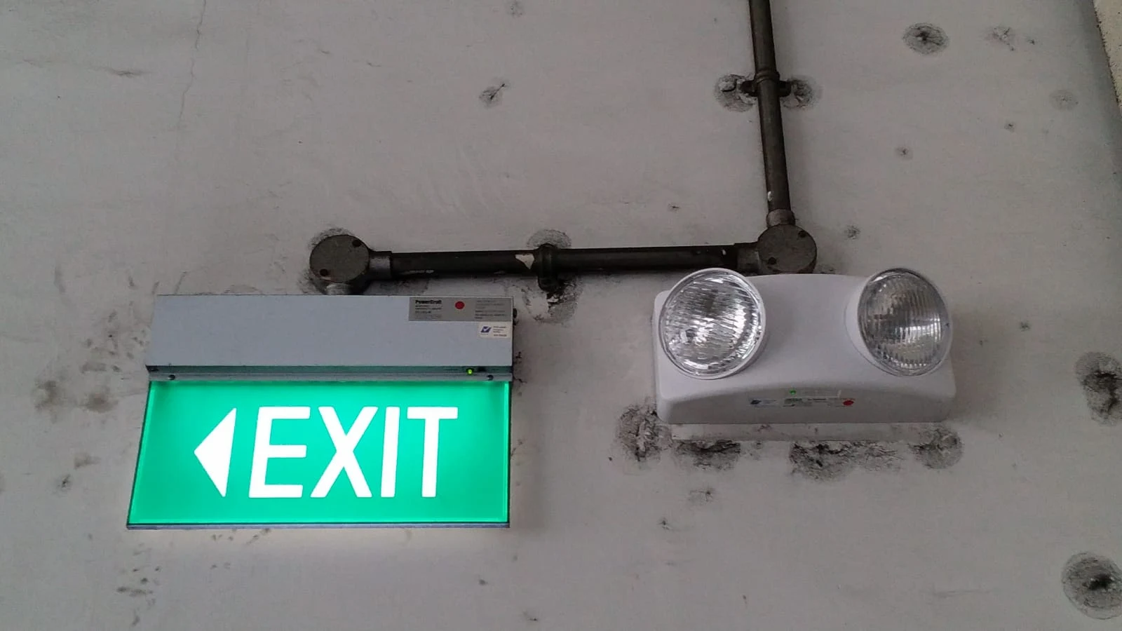 Fire safety exit sign and emergency lighting installation Singapore