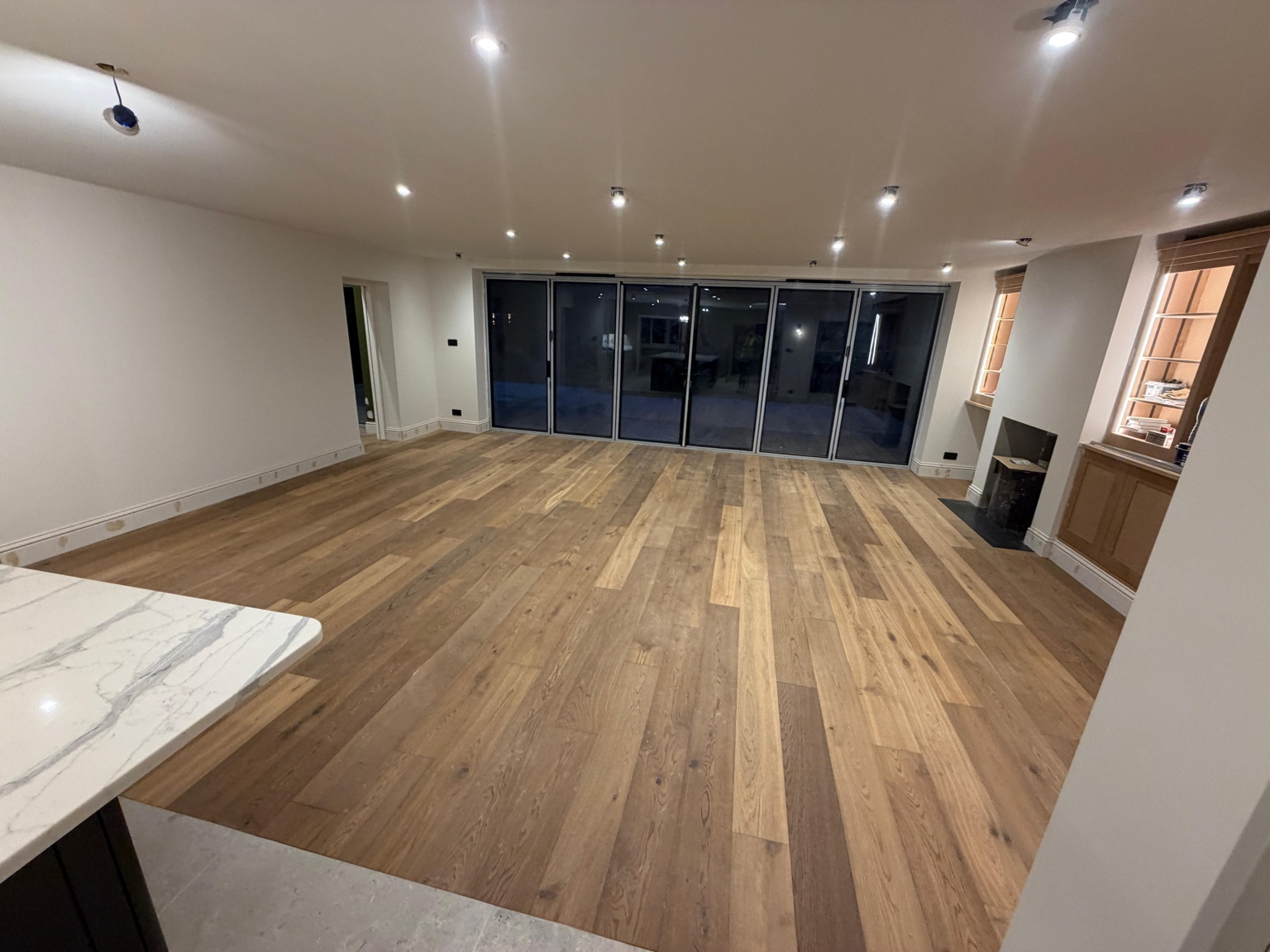 Engineered oak flooring installation Surrey — MITRE Carpentry
