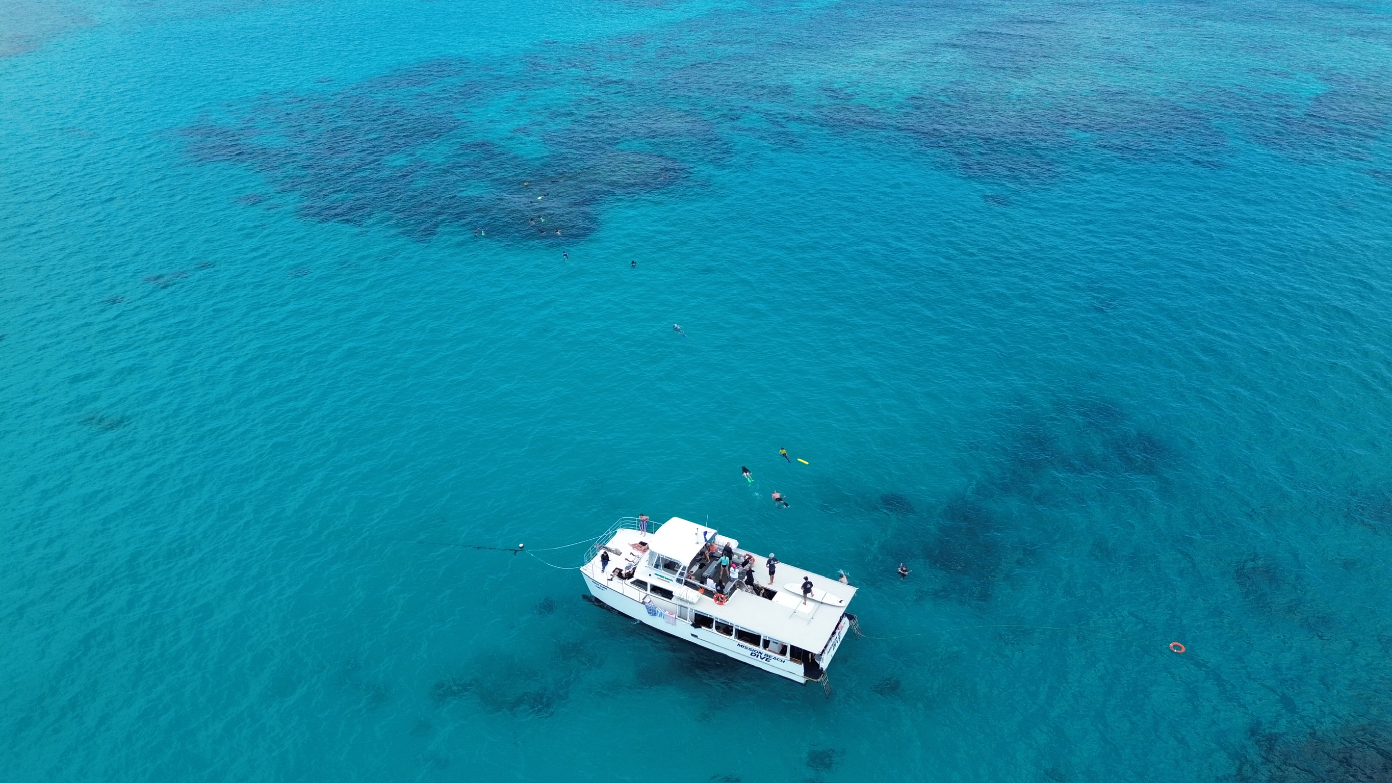 Aerial drone view of the Great Barrier Reef near Bedarra Island, Mission Beach Queensland